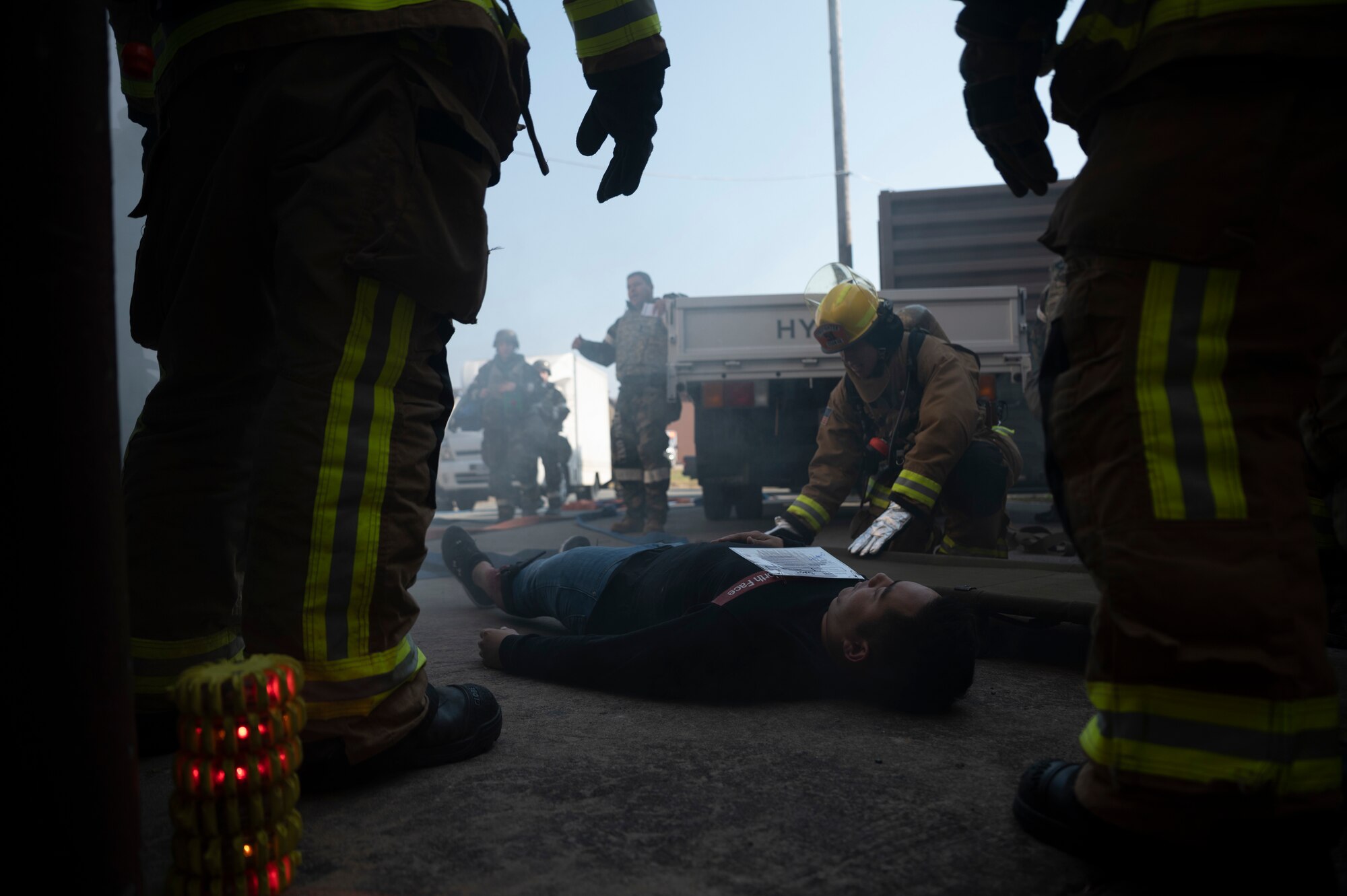 U.S. Air Force 51st Civil Engineer Squadron firemen perform Tactical Combat Casualty Care on a simulated casualty during a training event as part of Vigilant Storm 2023 at Osan Air Base, Republic of Korea, Oct. 31, 2022.