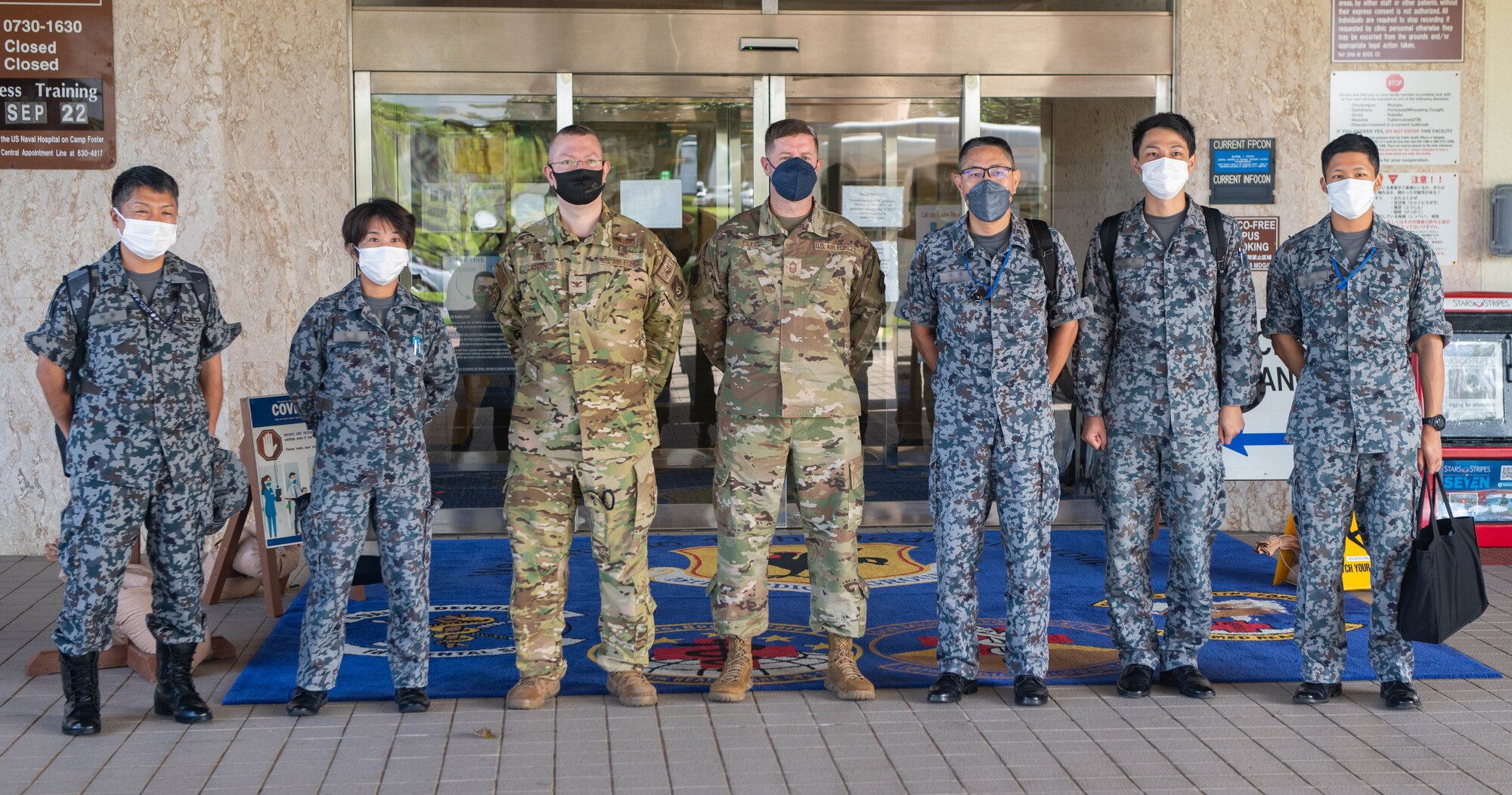 JASDF poses with military medical professionals.