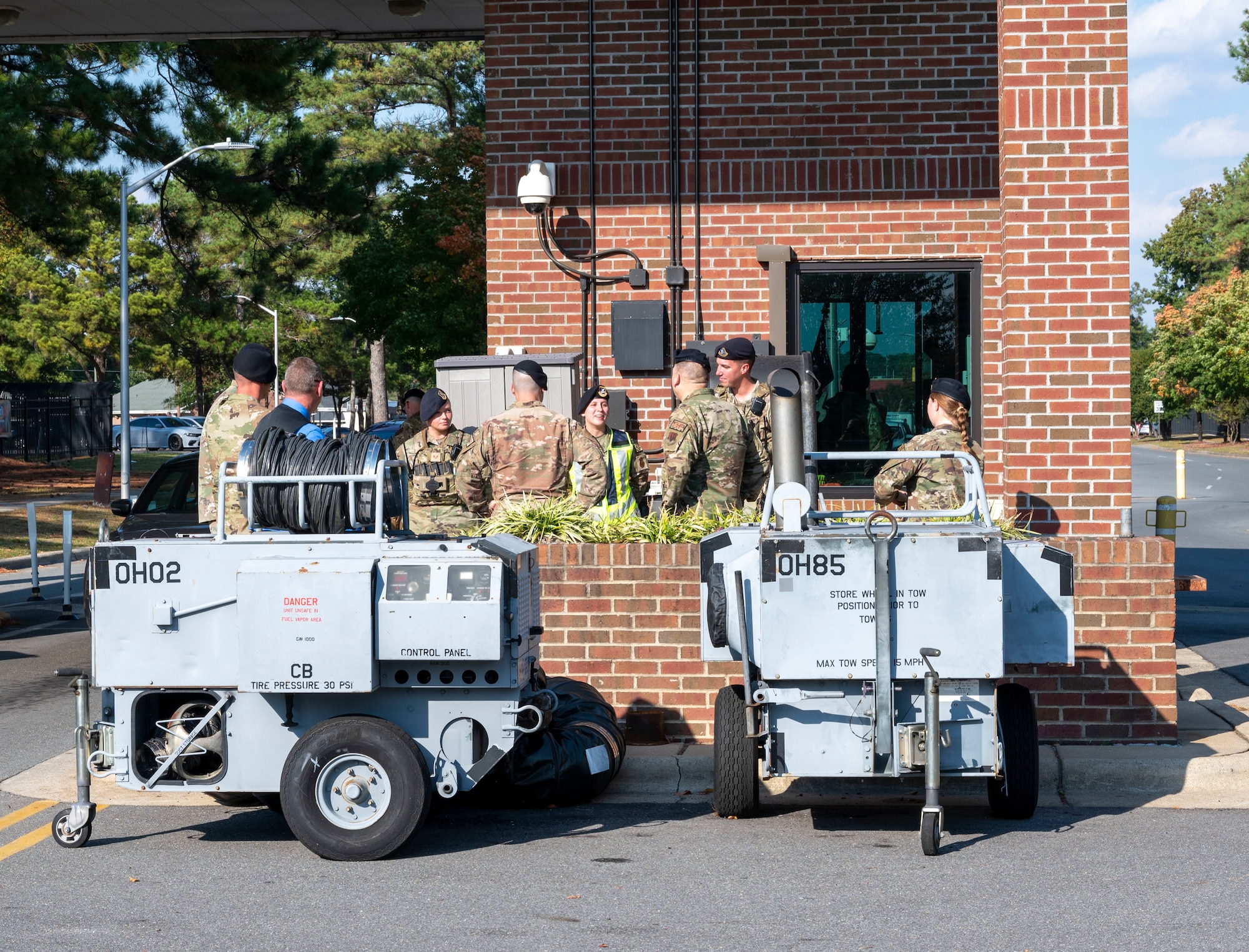 Airmen assigned to the 4th Security Forces Squadron and Air Combat Command meet with security forces members at Berkeley Gate at Seymour Johnson Air Force Base, North Carolina, Oct. 17, 2022. During the visit, Airmen assigned to ACC learned more about 4th SFS leadership and mission, and toured several locations on base to gain a better understanding of Seymour Johnson AFB’s capabilities. (U.S. Air Force photo by Airman 1st Class Sabrina Fuller)