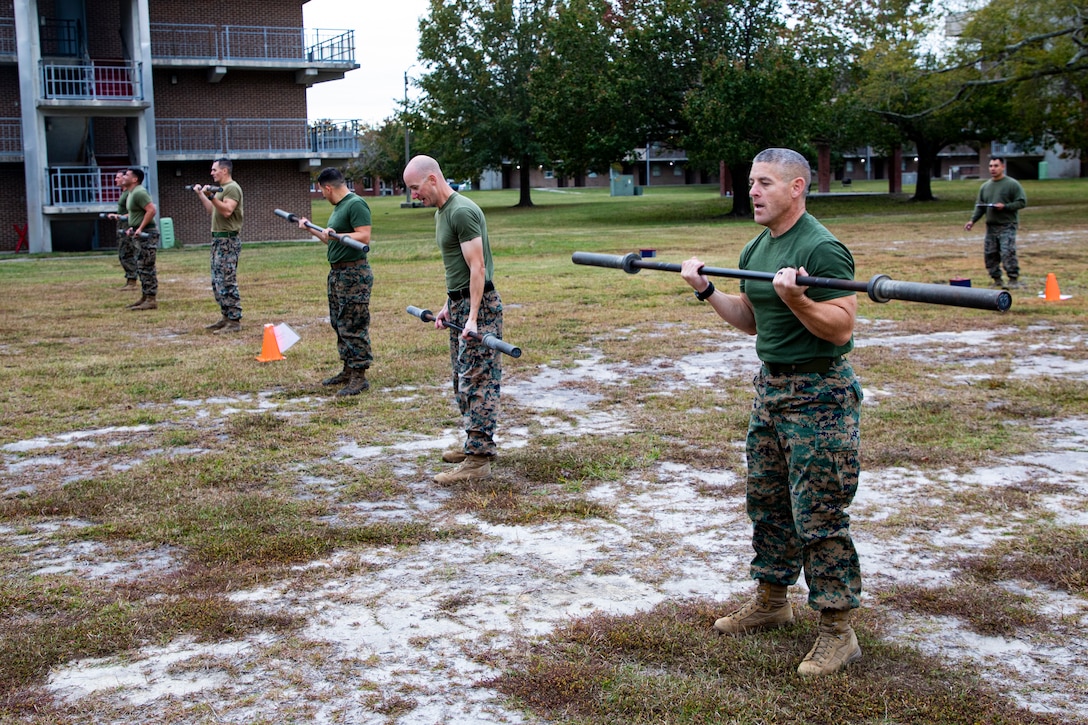 U.S. Marines assigned to the 24th Marine Expeditionary Unit conduct a unit physical training (PT) competition on Camp Lejeune, North Carolina, October 28, 2022. PT helps raise unit morale, build camaraderie, and prepares Marines for the mental and physical challenges of the next deployment. (U.S. Marine Corps photo by Cpl. Davis Harris)