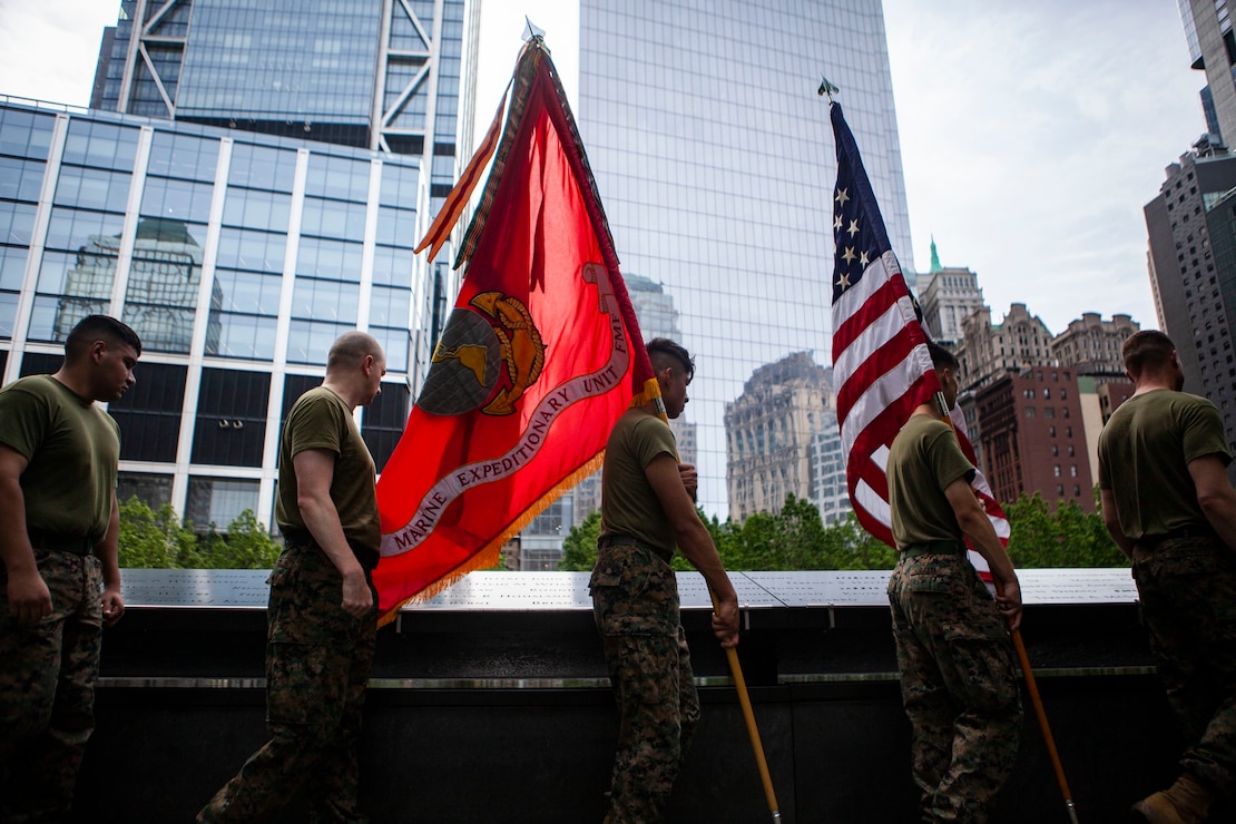 U.S. Marines with the 24th Marine Expeditionary Unit, U.S. Navy Sailors assigned to the USS Bataan (LHD 5) as well as other members of military and government organizations pose for a picture after conducting a 9/11 Freedom Run during Fleet Week New York 22.