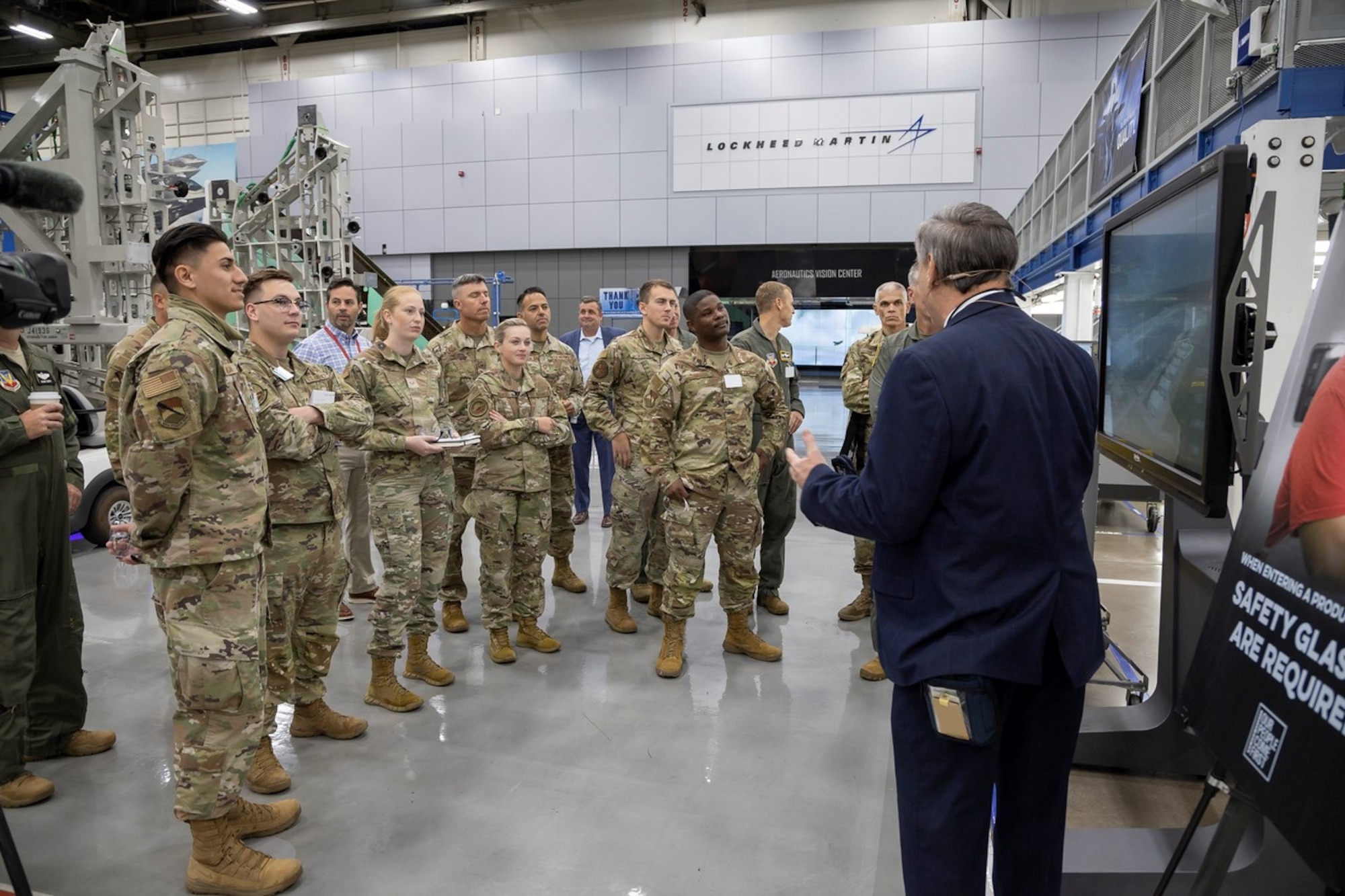 U.S. Airmen assigned to Tyndall Air Force Base, Florida, receive a briefing on Lockheed Martin’s F-35 Lightning II facility at the Lockheed Martin factory in Fort Worth, Texas, Oct. 20, 2022.