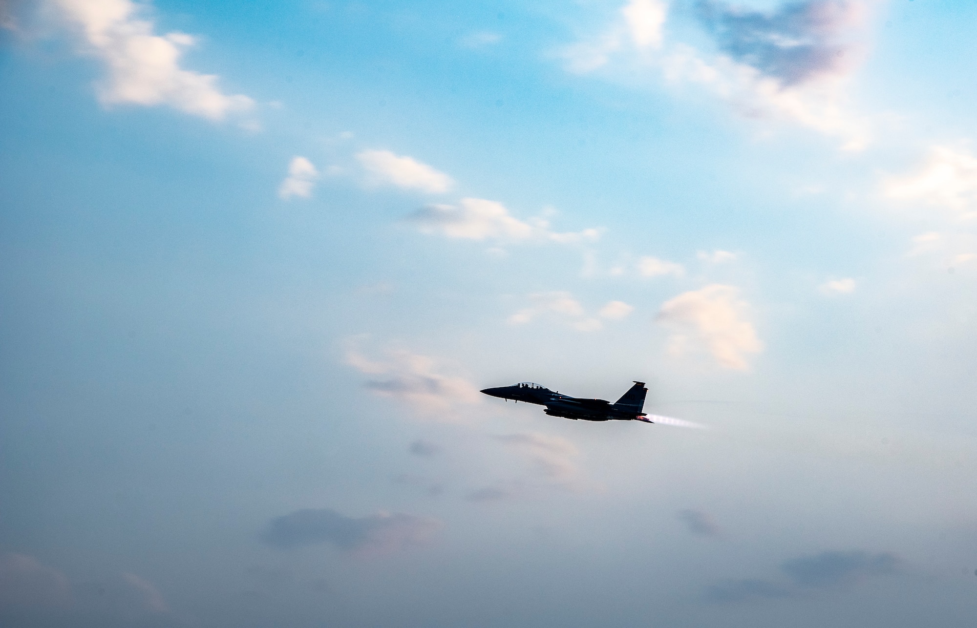 An F-15E Strike Eagle with the 332d Air Expeditionary Wing takes off at an undisclosed location, Southwest Asia, Oct. 26, 2022. The F-15E is an extremely versatile aircraft, capable of carrying out combat missions anywhere in the world. (U.S. Air Force photo by: Tech. Sgt. Jim Bentley)