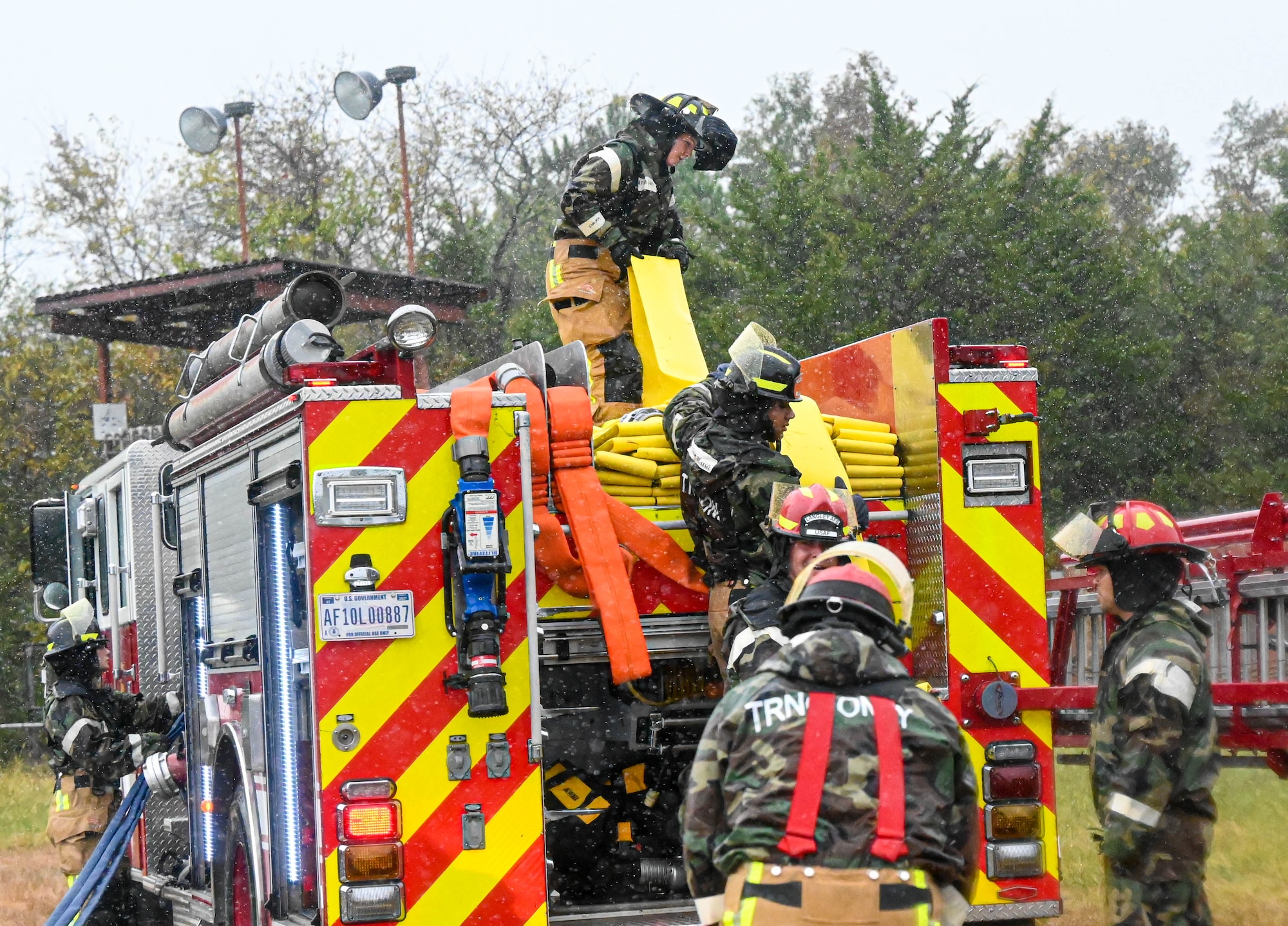 firefighters train through a base-wide CBRN exercise