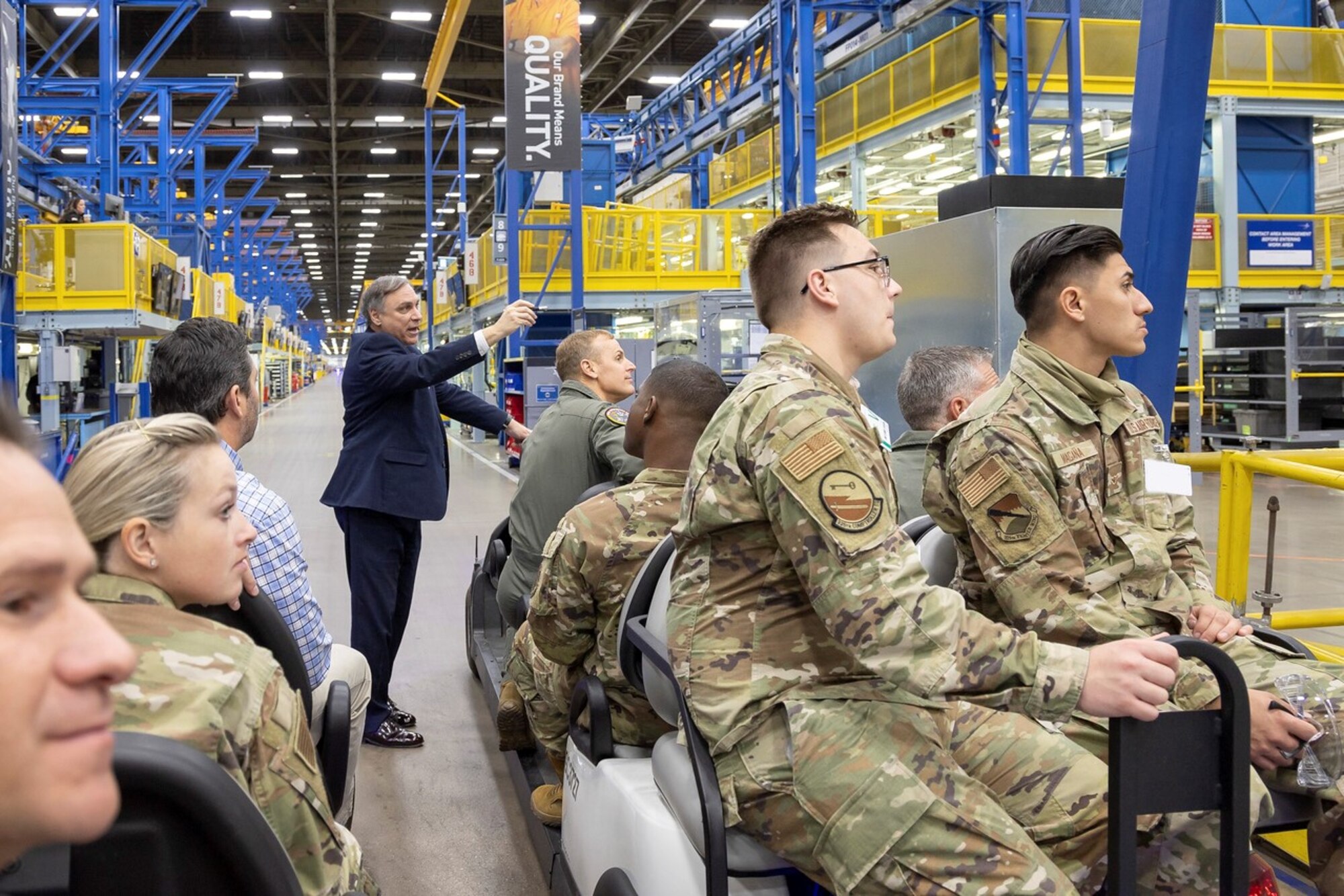 U.S. Airmen assigned to Tyndall Air Force Base, Florida, receive a tour of the Lockheed Martin factory in Fort Worth, Texas, Oct. 20, 2022