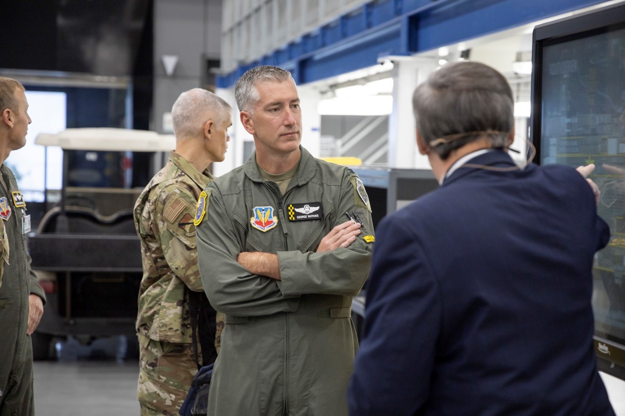 U.S. Air Force Col. George Watkins, 325th Fighter Wing commander, center, is briefed on Lockheed Martin’s F-35 Lightning II facility at the Lockheed Martin factory in Fort Worth, Texas, Oct. 20, 2022.