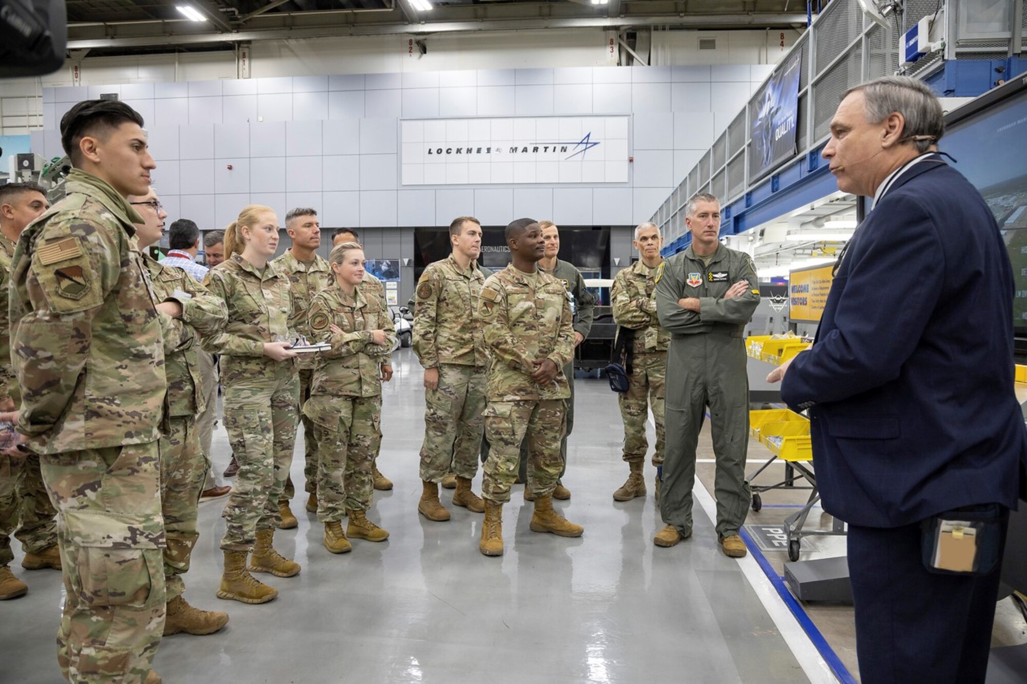 U.S. Airmen assigned to Tyndall Air Force Base, Florida, receive a briefing on Lockheed Martin’s F-35 Lightning II facility at the Lockheed Martin factory in Fort Worth, Texas, Oct. 20, 2022.