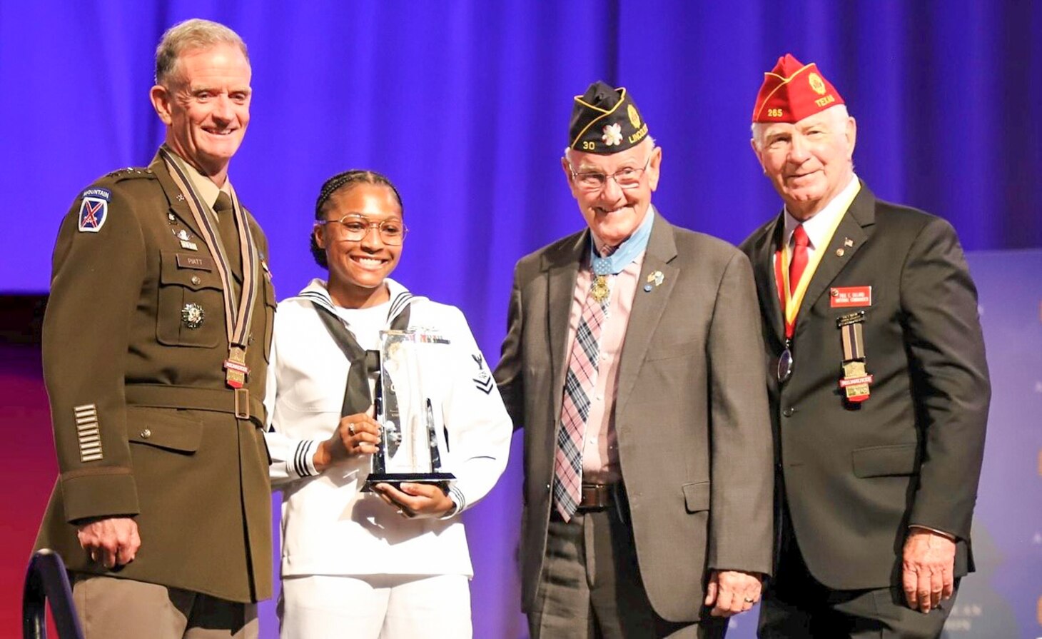 Information Systems Technician 1st Class Annie Holder was presented the Spirit of Service Award from top leaders of the American Legion at the their 103rd National Convention in Milwaukee, Wis. Holder is currently stationed at Information Warfare Training Command Virginia Beach, where she serves as a system administrator instructor.
