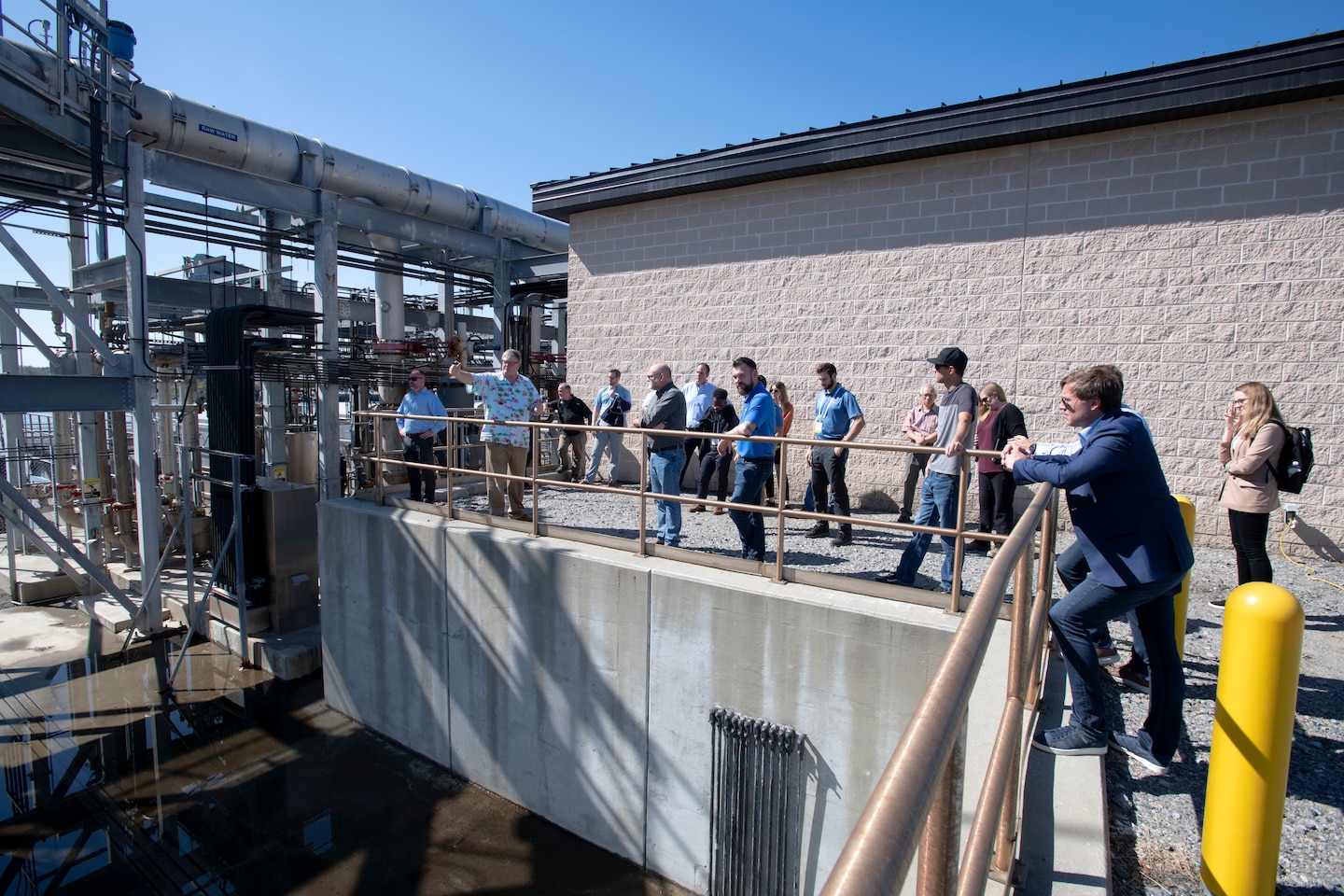 SAVANNAH, Ga. – Bruce Bennett, dissolved oxygen facilities manager for the U.S. Army Corps of Engineers, Savannah District, and Kate Dixon, design branch chief, lead a technical information tour of the lower Savannah River dissolved oxygen plant to attendees from the 2022 Hydraulic Institute Conference on Oct. 24, 2022. The Hydraulic Institute develops standards and technical resources for pump systems. They are responsible for publishing national standards covering pump and system nomenclature, definitions, design, application, installation, operation, maintenance, and testing. They also offer guidebooks and training  on proper application and design of pumps and pump systems to industry professionals. USACE photo by Mel Orr.