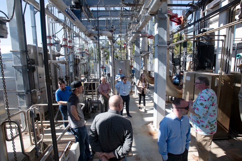 SAVANNAH, Ga. – Bruce Bennett, dissolved oxygen facilities manager for the U.S. Army Corps of Engineers, Savannah District, and Kate Dixon, design branch chief, lead a technical information tour of the lower Savannah River dissolved oxygen plant to attendees from the 2022 Hydraulic Institute Conference on Oct. 24, 2022. The Hydraulic Institute develops standards and technical resources for pump systems. They are responsible for publishing national standards covering pump and system nomenclature, definitions, design, application, installation, operation, maintenance, and testing. They also offer guidebooks and training  on proper application and design of pumps and pump systems to industry professionals. USACE photo by Mel Orr.