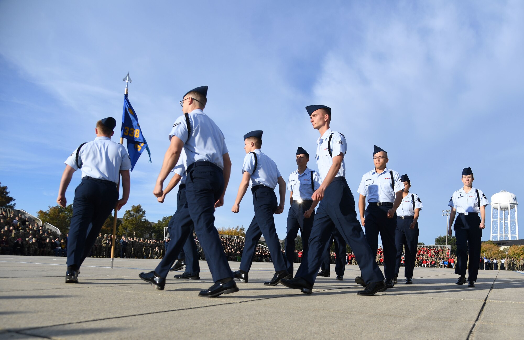 Members of the 338th Training Squadron regulation drill team perform during the 81st Training Group drill down on the Levitow Training Support Facility drill pad at Keesler Air Force Base, Mississippi, Oct. 28, 2022.