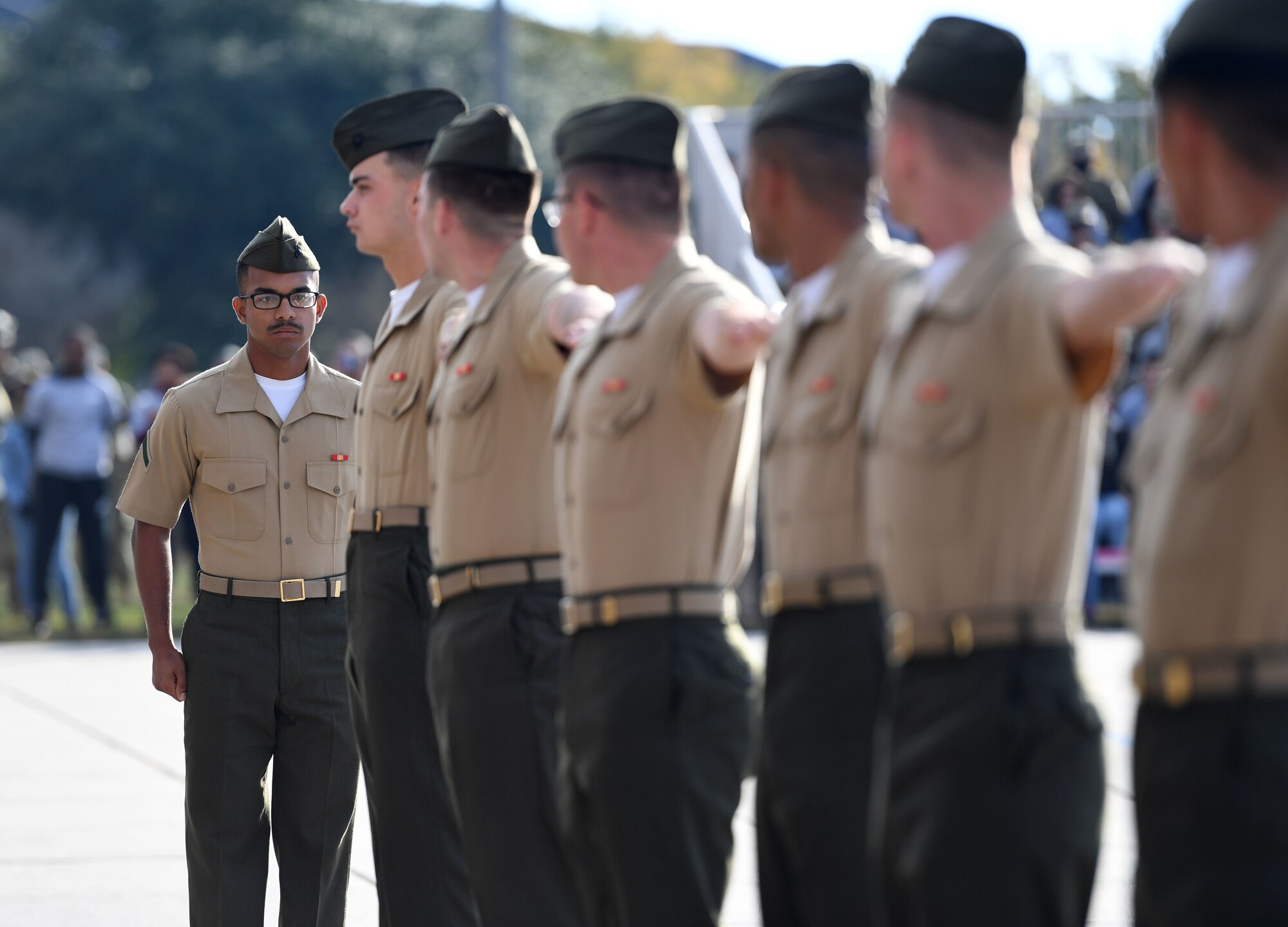 Members of the Keesler Marine Detachment regulation drill team perform during the 81st Training Group drill down on the Levitow Training Support Facility drill pad at Keesler Air Force Base, Mississippi, Oct. 28, 2022.