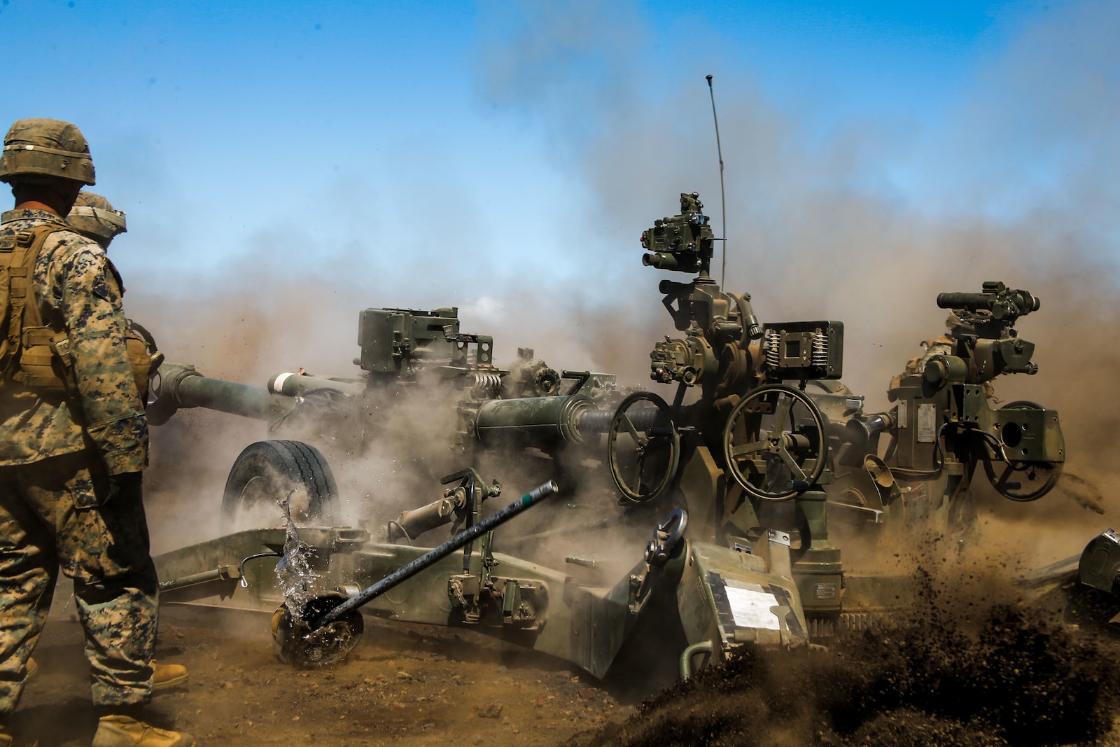 U.S. Marines with 1st Battalion, 12th Marines, 3d Marine Division fire an M777 A2 Howitzer during Spartan Fury 22.1 at Pohakuloa Training Area, Hawaii, March 4, 2022.