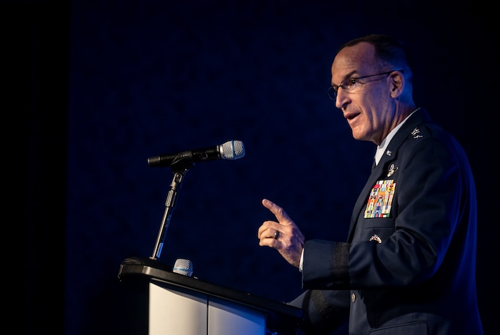 Photo of Lt. Gen. John Healy speaking at the Airlift/Tanker Association Symposium.
