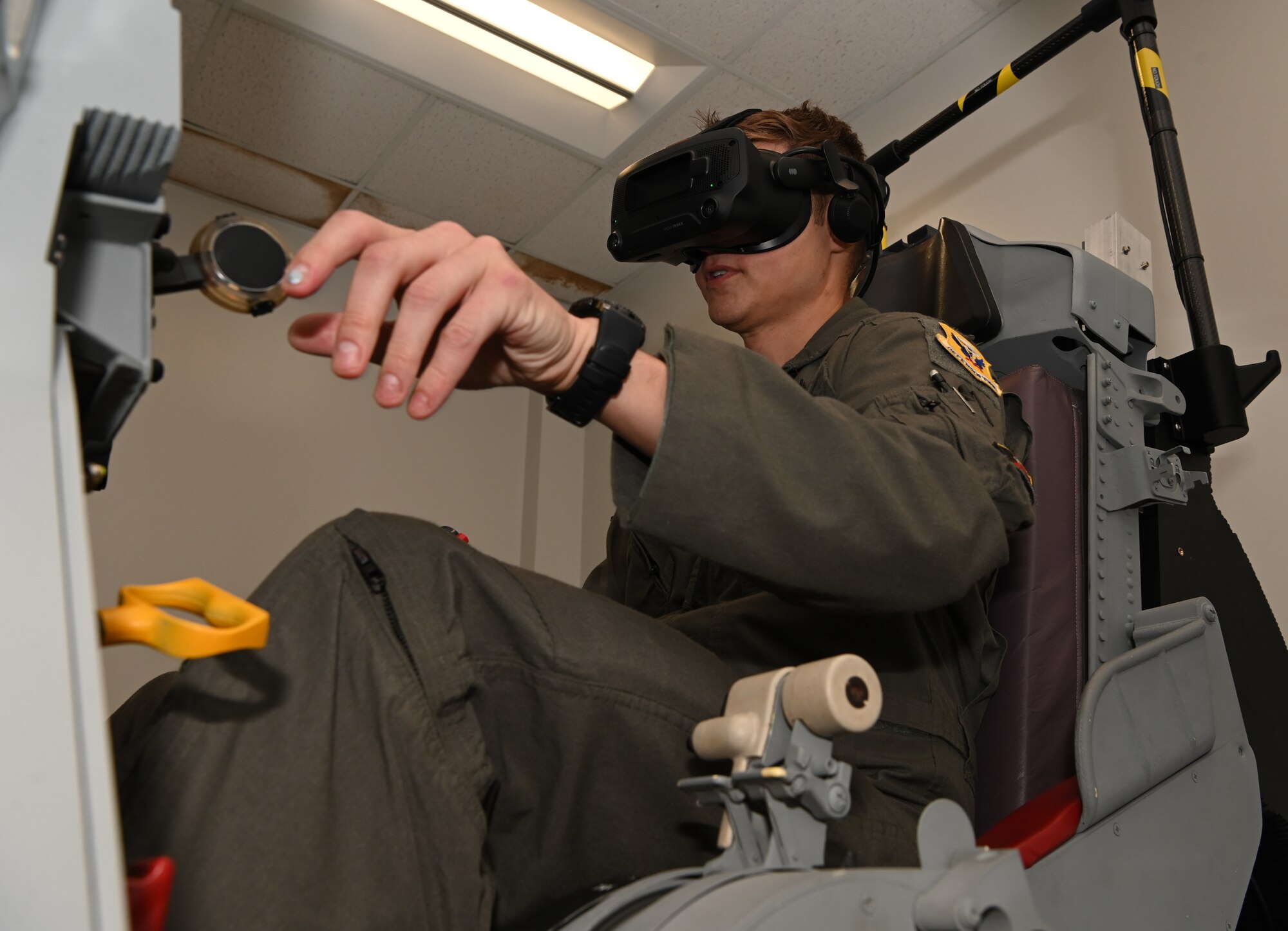 Air Force pilots training in simulator
