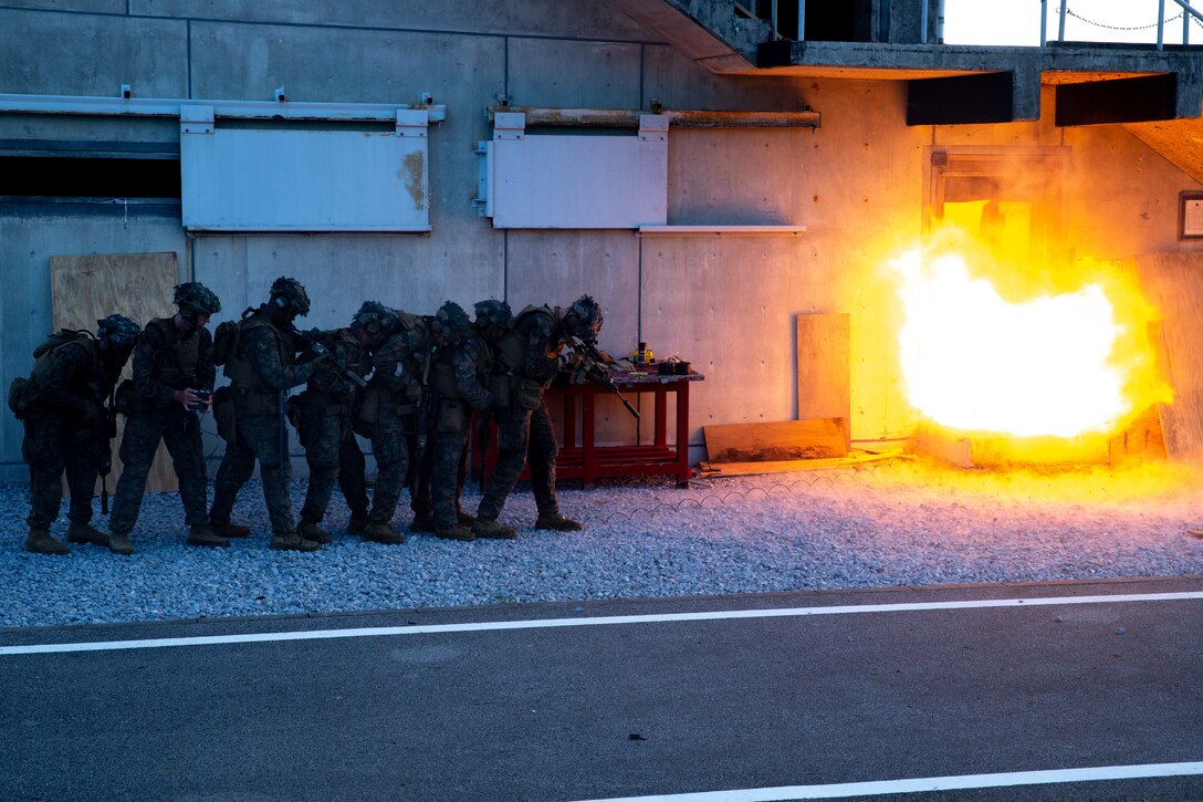 U.S. Marines with 3d Battalion, 2d Marines conduct close-quarters battle training during a raid and demolition range on Camp Hansen, Okinawa, Japan, July 22, 2022.