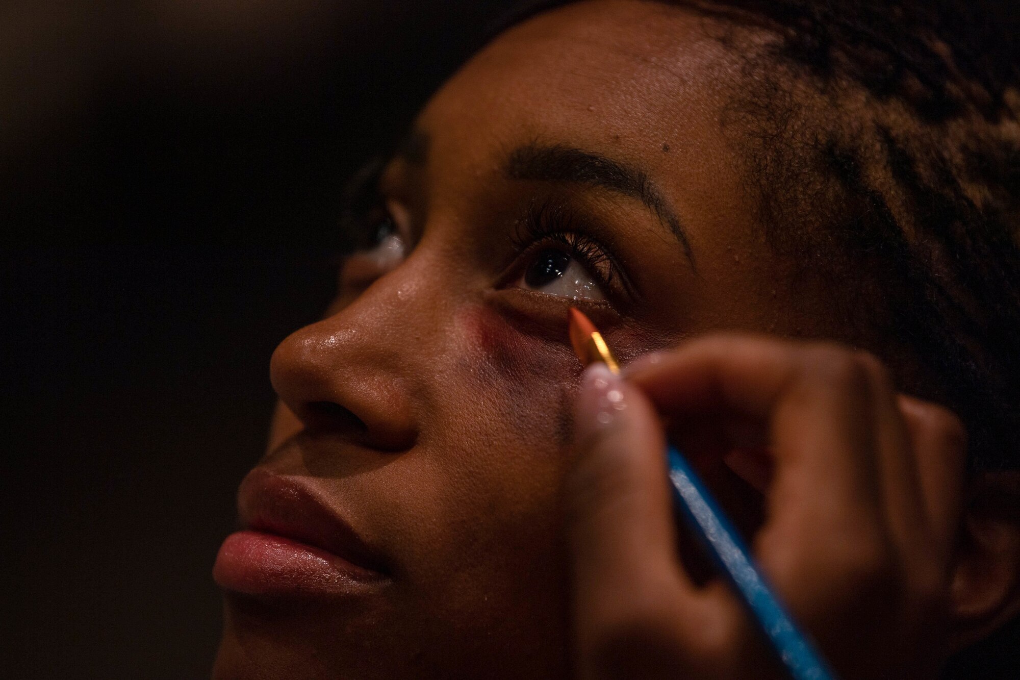 U.S. Air Force Tech.Sgt. Roxy Richardson, 721st Mission Support Squadron noncommissioned officer in charge of operations, participates as one of 6 volunteers in the Black Eye Project at Ramstein Air Base, Germany, Oct. 26, 2022.