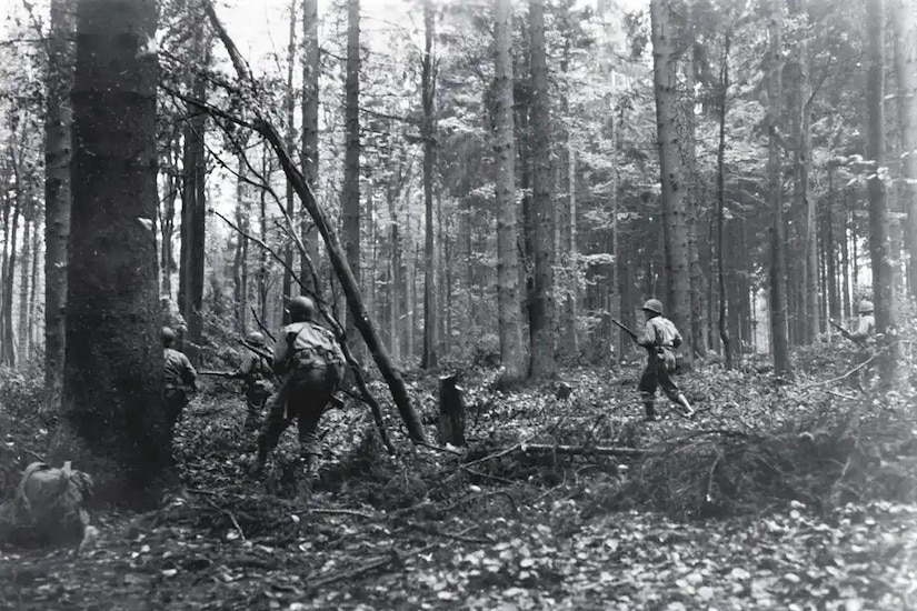 Soldiers from the 28th Infantry Division advance through the Hürtgen Forest in Germany on Nov. 2, 1944, during the Battle of Hürtgen Forest.