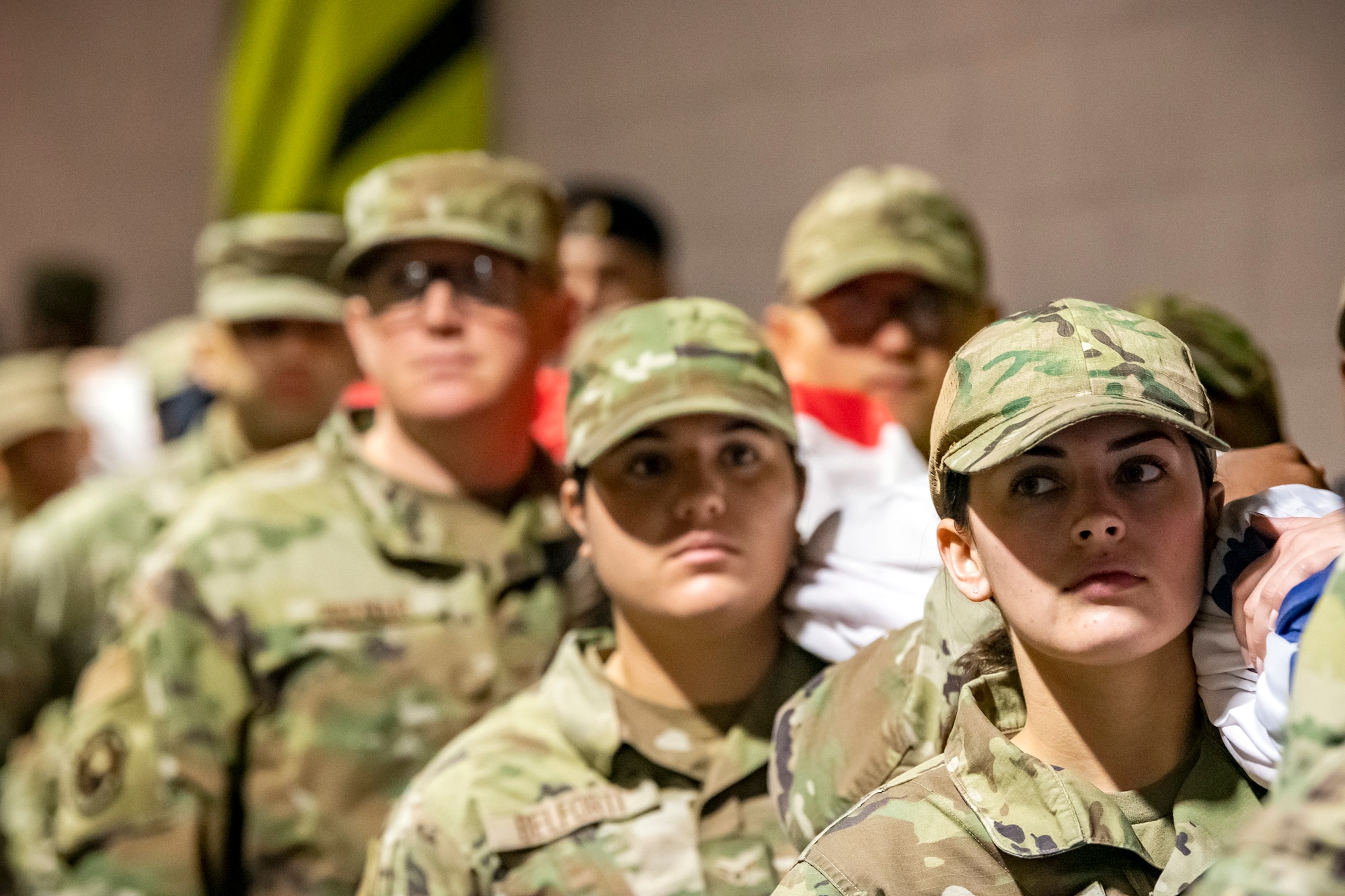 U.S. Air Force Airman 1st Class Kennedy Lawson, right, along with Airmen from the 501st Combat Support Wing hold an American flag at Wembley Stadium, in London, England, Oct. 30, 2022. Approximately 70 uniformed personnel represented the U.S. Air Force and nation by unveiling an American flag during the pre-game ceremonies of the Jacksonville Jaguars and Denver Broncos NFL game. (U.S. Air Force photo by Staff Sgt. Eugene Oliver)