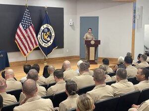 Senior Chief Logistics Specialist Norma Porter, the recipients of the U.S. Navy Senior Enlisted Academy (SEA) Peter Tomich Distinguished Leadership Award delivers a speech at the SEA Class 254 graduation Sept. 1.