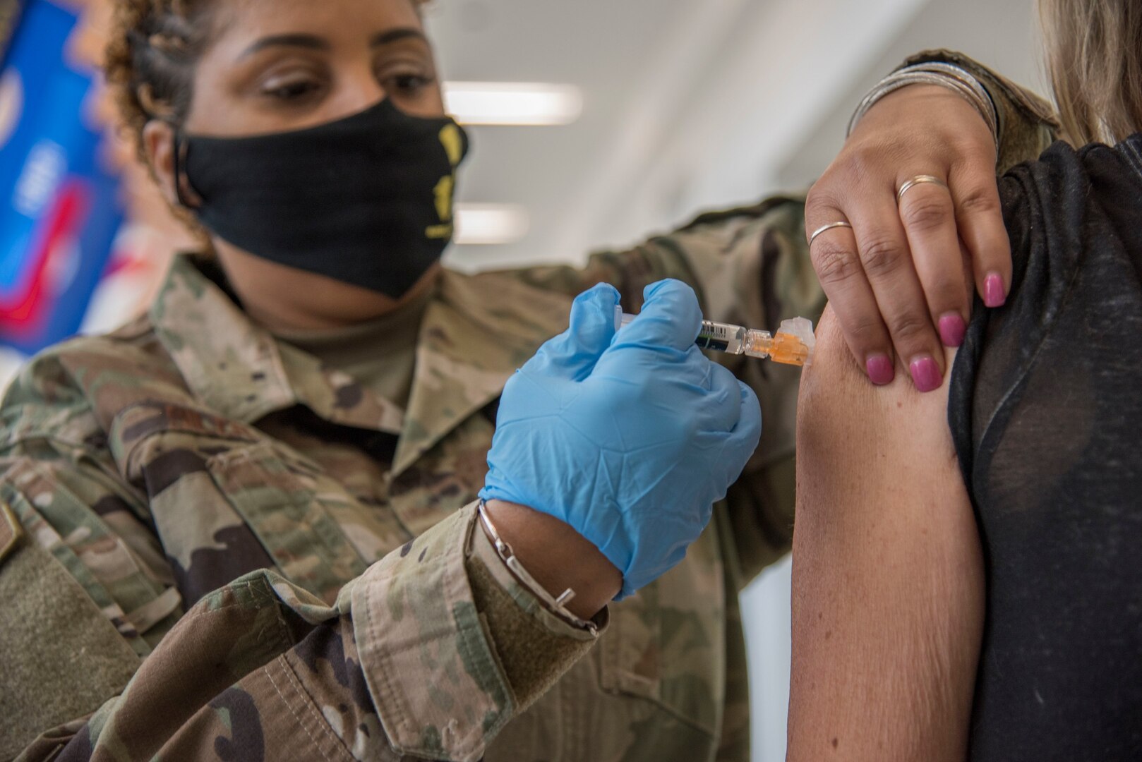 Officer giving flu shot