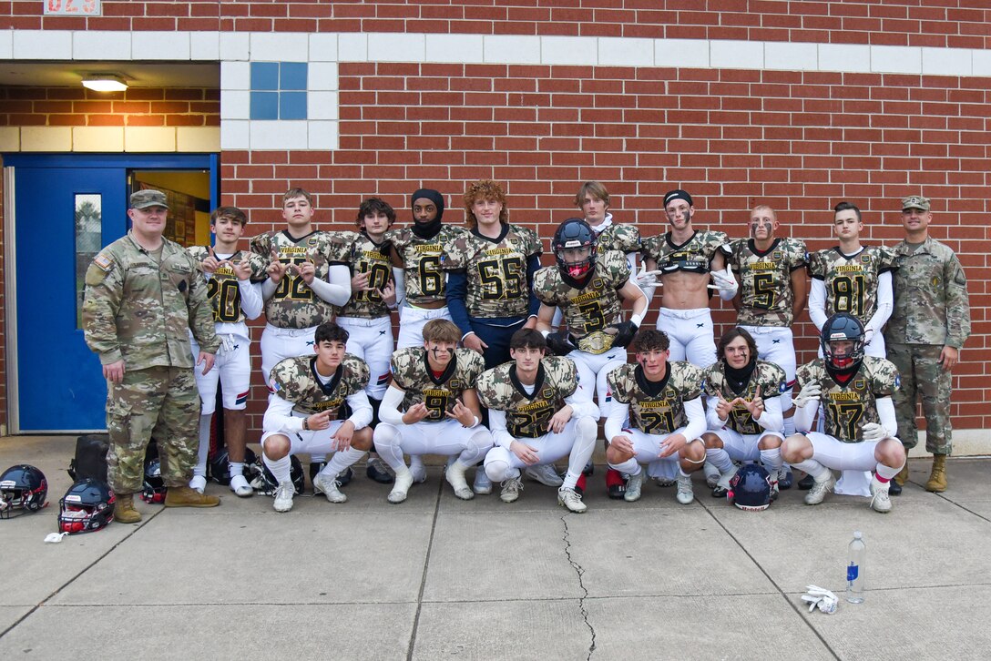 Liberty High School debuts the Virginia Army National Guard’s new football jerseys Oct. 28, 2022, at a home game against John Handley High School in Bealeton, Virginia. Staff Sgt. Dakota Baughan, area Virginia Army National Guard recruiter and a graduate of Liberty High School, secured the jerseys for Liberty’s use at their military appreciation game. (U.S. Army National Guard photo by Sgt. 1st Class Terra C. Gatti)