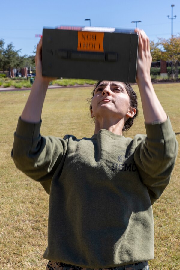 U.S. Marine Corps Sgt. Hannae Jeffal with Headquarters Battalion, Marine Force Reserve, takes part in a pugil stick competition at Marine Corps Support Facility New Orleans, Oct. 26, 2022. The annual pugil stick "King of the Ring" competition is held to foster the spirit of competition and camaraderie within the unit through friendly competition. (U.S. Marine Corps photo by Sgt. Juan Carpanzano)