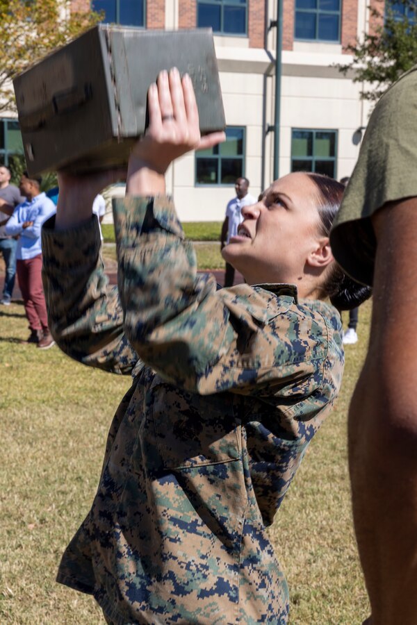 U.S. Marine Corps Cpl. Allison Tomlin with Headquarters Battalion, Marine Force Reserve, takes part in a pugil stick competition at Marine Corps Support Facility New Orleans, Oct. 26, 2022. The annual pugil stick "King of the Ring" competition is held to foster the spirit of competition and camaraderie within the unit through friendly competition. (U.S. Marine Corps photo by Sgt. Juan Carpanzano)