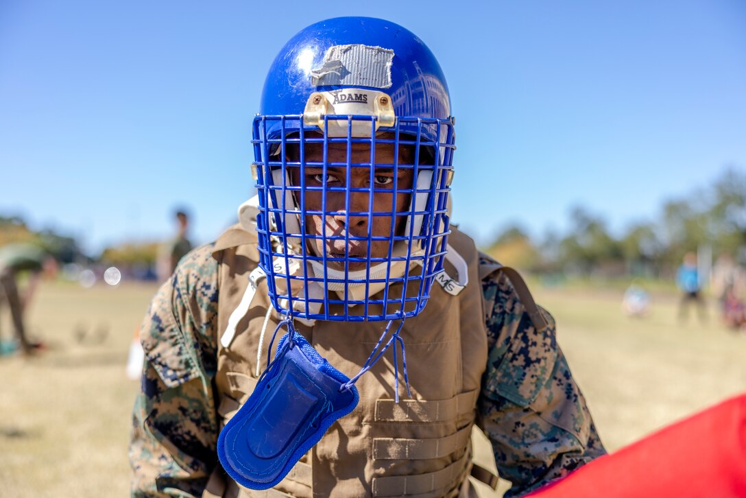 U.S. Marine Corps Pfc. Class Jaden Lanier with Headquarters Battalion, Marine Force Reserve, takes part in a pugil stick competition at Marine Corps Support Facility New Orleans, Oct. 26, 2022. The annual pugil stick "King of the Ring" competition is held to foster the spirit of competition and camaraderie within the unit through friendly competition. (U.S. Marine Corps photo by Sgt. Juan Carpanzano)