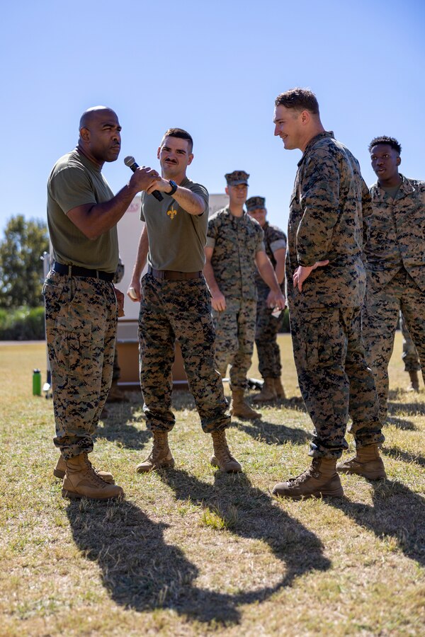 U.S. Marines with Headquarters Battalion, Marine Force Reserve, take part in a pugil stick competition at Marine Corps Support Facility New Orleans, Oct. 26, 2022. The annual pugil stick "King of the Ring" competition is held to foster the spirit of competition and camaraderie within the unit through friendly competition. (U.S. Marine Corps photo by Sgt. Juan Carpanzano)
