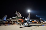 U.S. Air Force Maj. Mathew “Chaff” Crabb, pilot, 120th Fighter Squadron, 140th Wing, Colorado Air National Guard, Buckley Space Force Base, Colorado, prepares his aircraft for a training mission prior to a night flight during Red Flag 17-2 at Nellis Air Force Base, Nevada. The Red Flag exercise is a realistic combat training exercise involving the air forces of the United States, its allies, and coalition partners, and is conducted on the vast gunnery ranges of the 2.9 million acre Nevada Test and Training Range, a primary training area associated with Nellis AFB. The exercise brings in more than 100 aircraft and 3,000 personnel with the goal of preparing commanders and service members at all levels for war in a realistic training scenario. (U.S. Air National Guard photo by Senior Master Sgt. John Rohrer)