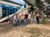 Members of the 168th Wing stand next to the KC-97 Stratofreighter for a photo after installing the refueling boom. The members volunteered to attach the refueling boom as a community service project to honor the aircraft's legacy while attending a leadership course in Colorado Springs, Colorado. (Courtesy photo)