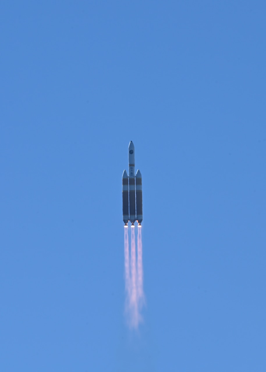 A rocket shoots upward.