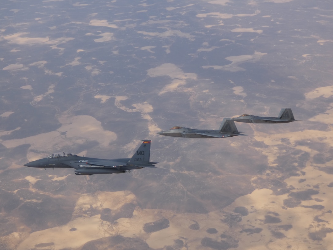 F-22 Raptors and F-15E Strike Eagles work in tandem in the
CENTCOM Area of Responsibility.