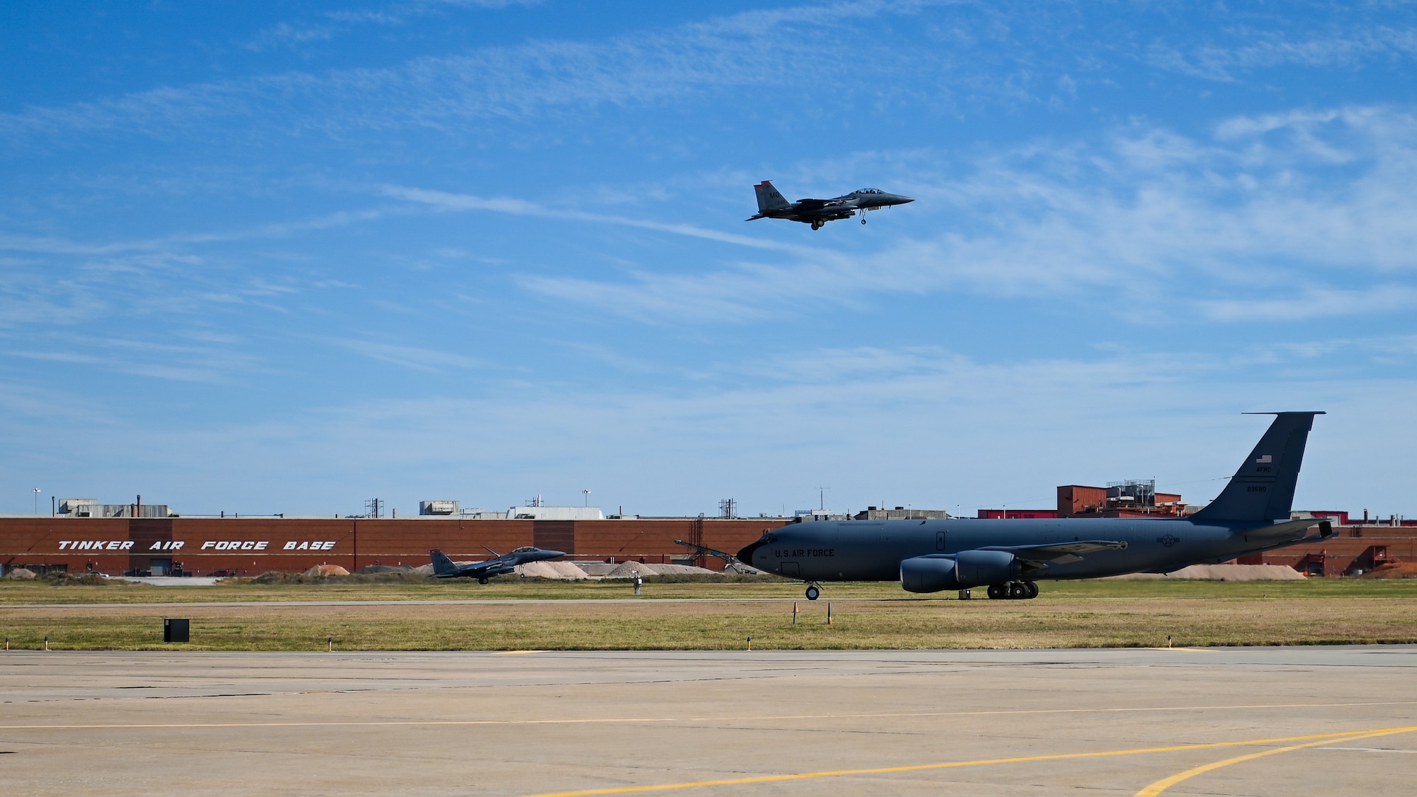 F-15 aircraft in air with KC-135 in foreground