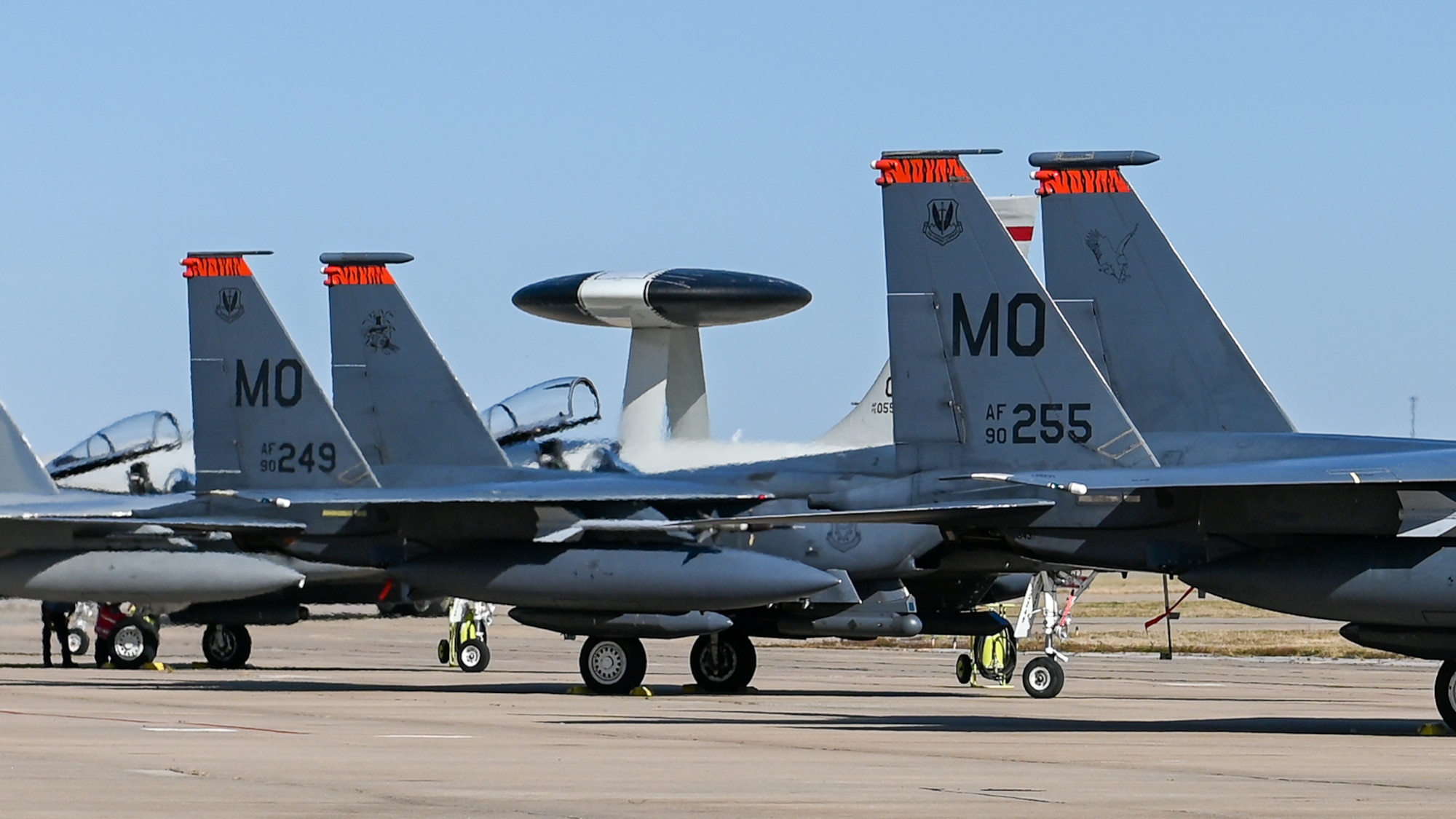 F-15 tails in front of E-3 rotodome