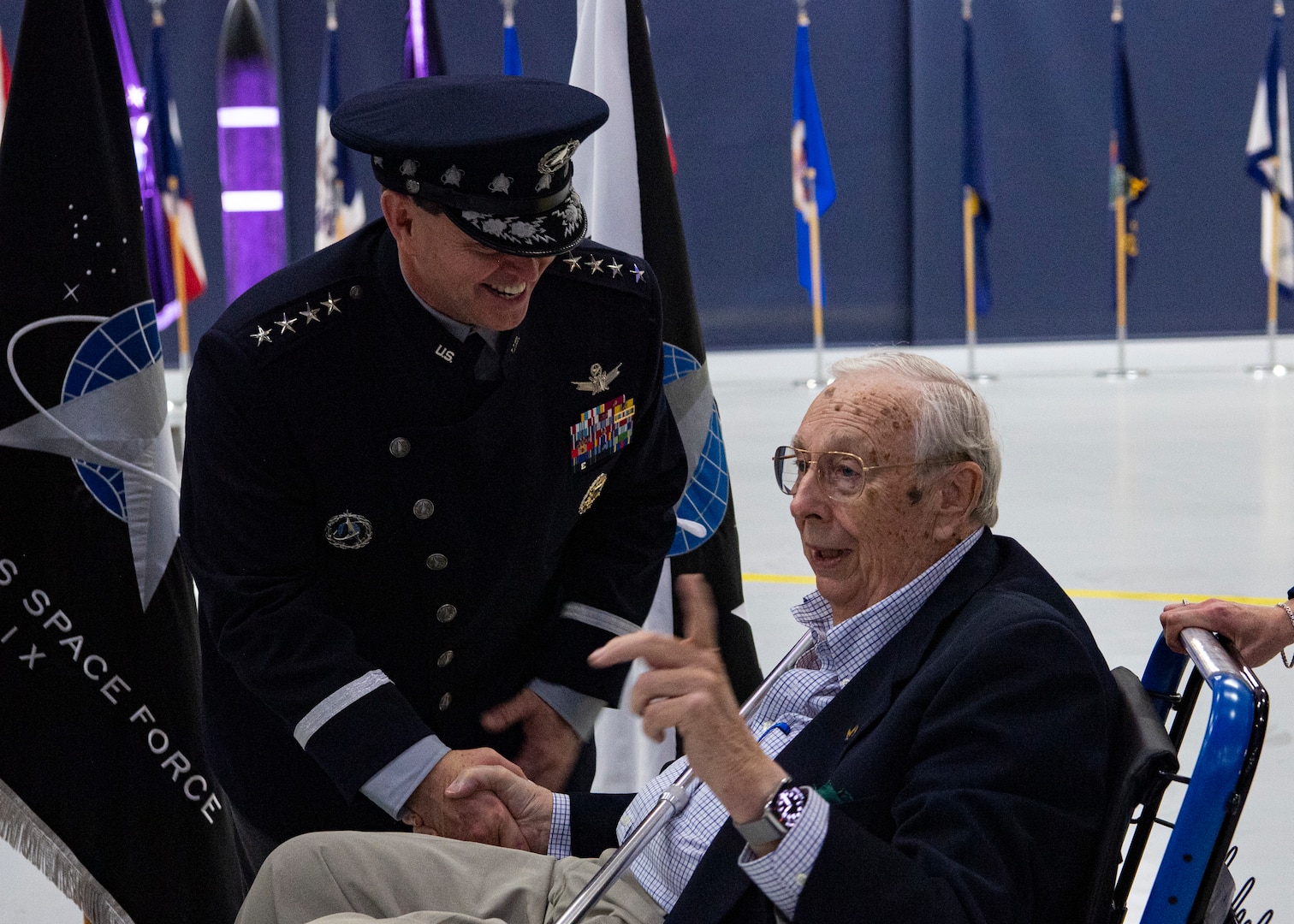 Chief of Space Operations Gen. Chance Saltzman greets  former Secretary of the Air Force  James Roche during the transition ceremony for the chief of space operations at Joint Base Andrews, Md., Nov. 2, 2022. Saltzman relieved Gen. John W. “Jay” Raymond as the second CSO, the senior uniformed officer heading the U.S. Space Force. (U.S. Air Force photo by Staff Sgt. Nick Z. Erwin)