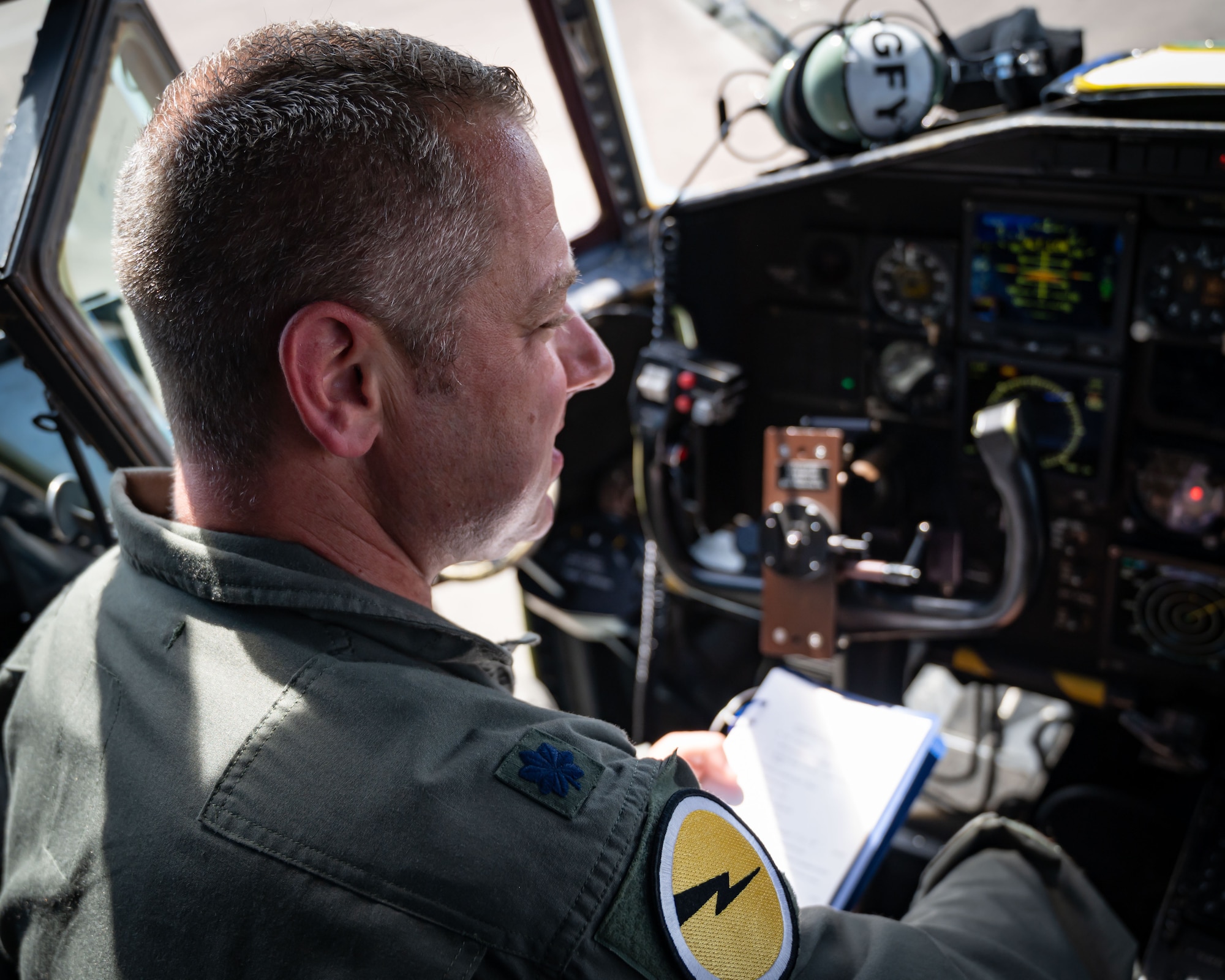 Air Force Lt. Col. Richard Paul Mastalerz II, a pilot assigned to the 103rd Airlift Wing, Connecticut Air National Guard, prepares to fly a C-130H aircraft, June 4, 2022 at Bradley Air National Guard Base, East Granby, Conn. The flight was Mastalerz’ first since being diagnosed with stage 3 colorectal cancer in 2020. (U.S. Air Force photo by Master Sgt. Tamara R. Dabney)