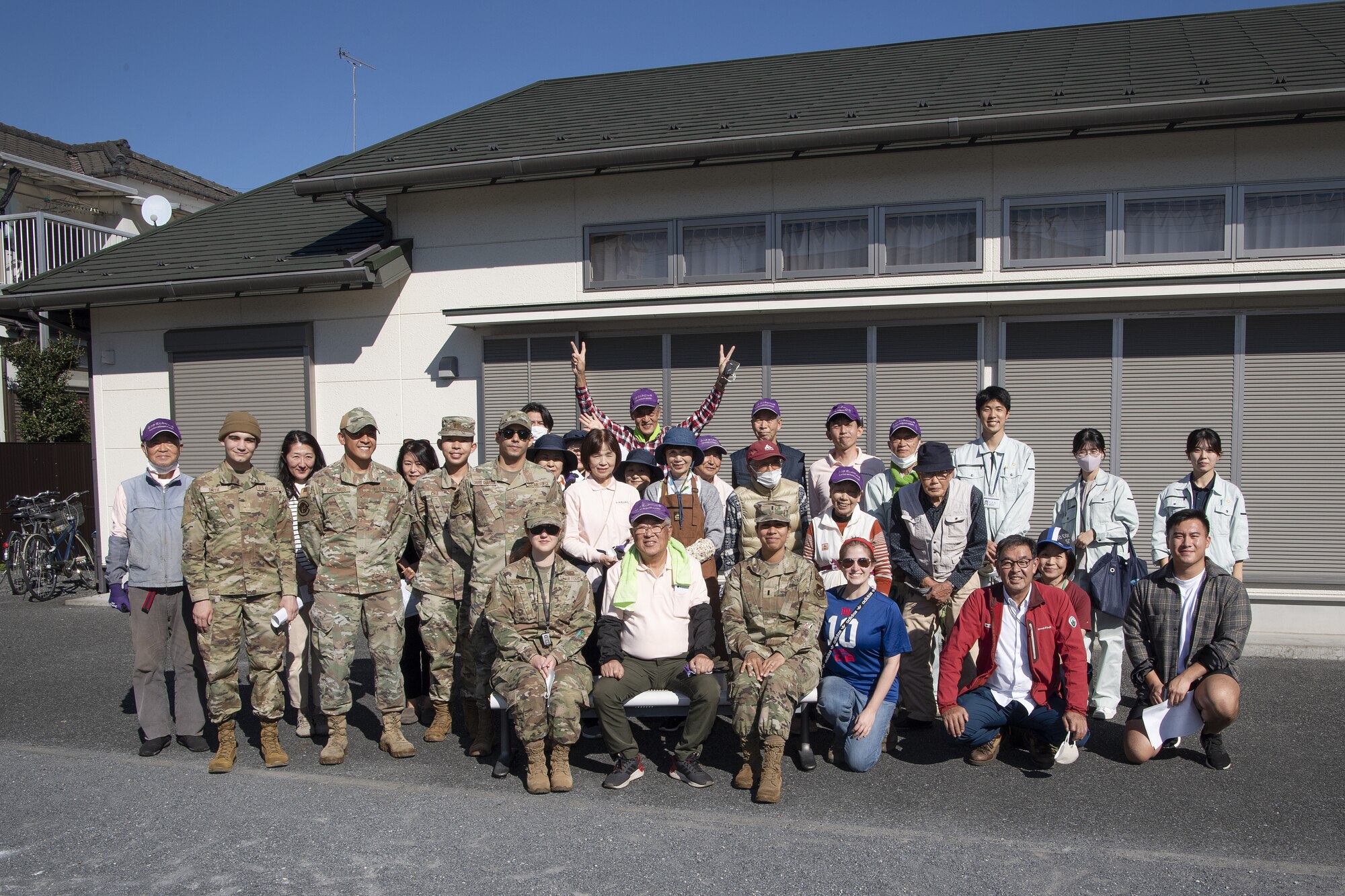 Airmen assigned to the 374th Airlift Wing gather with members of the Fussa City community during a bilateral beautification project at Fussa City, Japan, Oct. 31, 2022. The project was an opportunity for Team Yokota to strengthen its ties and friendship with Japanese neighbors outside the gates. (U.S. Air Force photo by Tech. Sgt. Christopher Hubenthal)