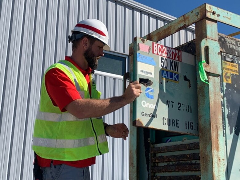A quality assurance representative inspects a temporary emergency generator in Florida. When a disaster occurs, the Federal Emergency Management Agency (FEMA) declares an emergency, coordinates with the district to deploy teams to impacted areas, and sends temporary emergency generators for deployed teams to set up. The generators are temporarily put in place to restore power to critical infrastructure such as hospitals, water supply centers and assisted living facilities. The generators are removed after primary generators or the main power supply are restored. (U.S. Army courtesy photo by Pittsburgh District)