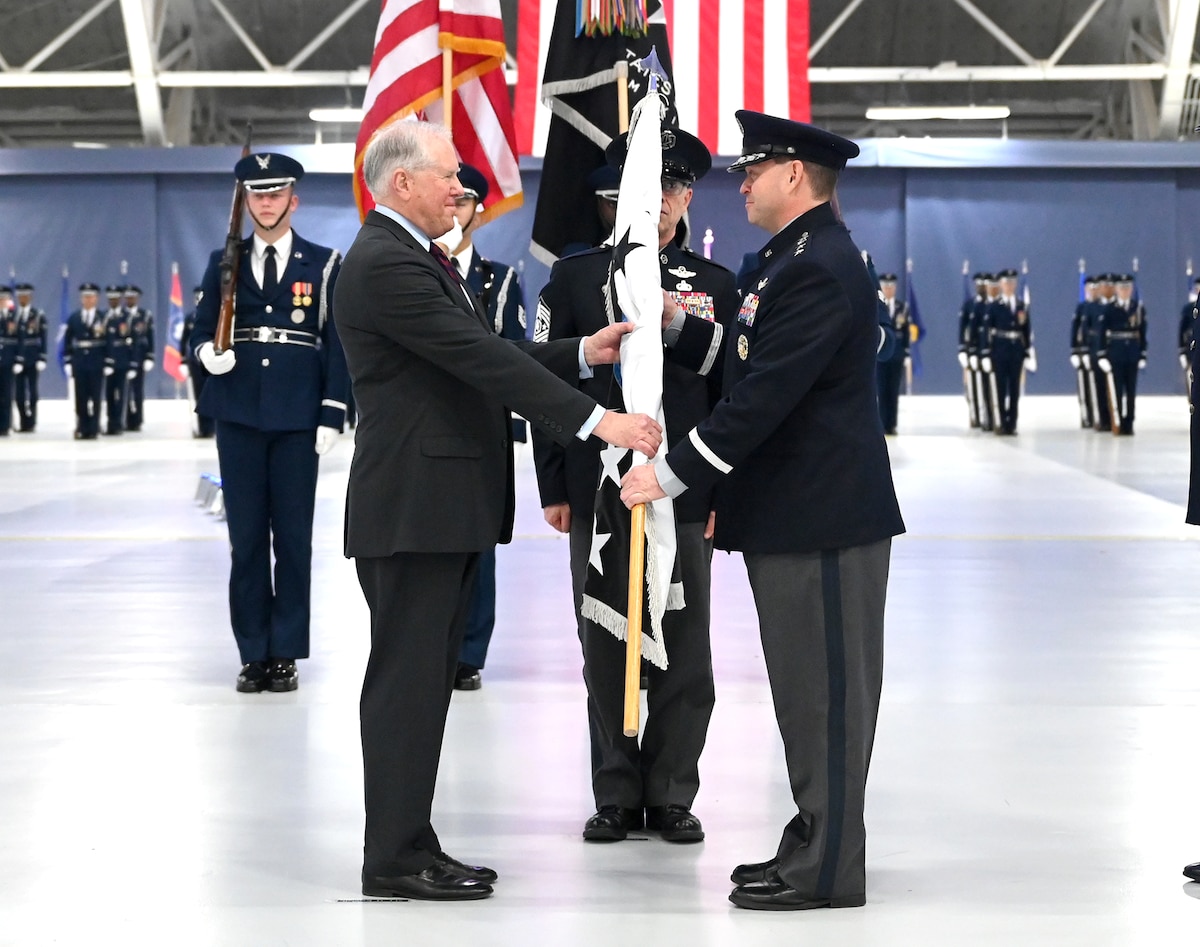 Gen. Chance Saltzman assumes command of the Space Force by accepting the flag from Secretary of the Air Force Frank Kendall at the transition ceremony for the Chief of Space Operations at Joint Base Andrews, Md., Nov. 2, 2022. Gen. Chance Saltzman relieved Gen. John W. “Jay” Raymond as the second CSO, the senior uniformed officer heading the Space Force. (U.S. Air Force photo by Andy Morataya)