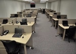 A workspace for government members relocated during a natural disaster is readily available at the Coast Guard’s National Continuity of Operations site in St. Louis. Base Detachment St. Louis and Electronics Support Detachment St. Louis personnel devoted more than 100 hours planning, 200 hours of deinstallation, 1,800 of installation and 400 hours of quality assurance to creating the new site. (U.S. Coast Guard photo by Petty Officer 2nd Class Ayla Kelley)