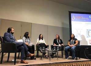 In this photo from the 2019 SHPE National Conference in Phoenix, former NSA DEIA Deputy Director Glorián Rivera-Alvarez (second from right) discusses professional experiences to an audience of Latinas in STEM during a SHPE-tinas panel.