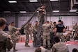 Air Assault students prepare equipment and supplies for sling load operations during training August 6, 2022, at Fort Indiantown Gap, Pennsylvania. Airmen, Soldiers and Marines participated in a two-week long Air Assault course.