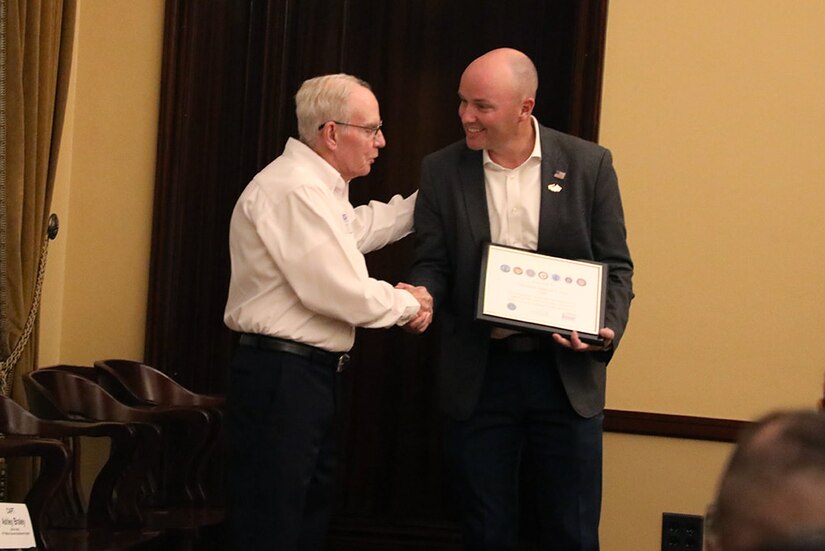 Mr. said Kim Watts, state chairman of the Utah Employer Support of the Guard and Reserve presented the Seven Seals and Patriot Awards to Gov. Spencer Cox at a ceremony on Oct. 26, 2022.