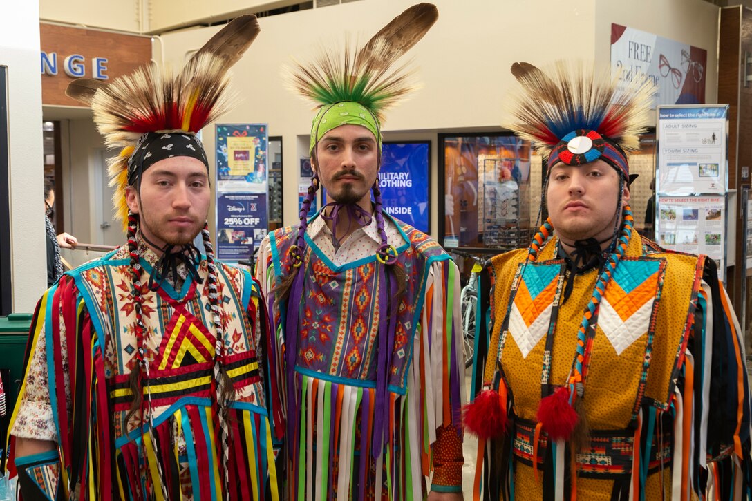 A group of attendees pose in traditional ceremonial Native American dress during the National American Indian Heritage Month opening ceremony on Edwards AFB. From Nov. 1-30, the observance month recognizes American Indians for their respect for natural resources and the Earth, having served with valor in our nation's conflicts and for their many distinct and important contributions to the United States.