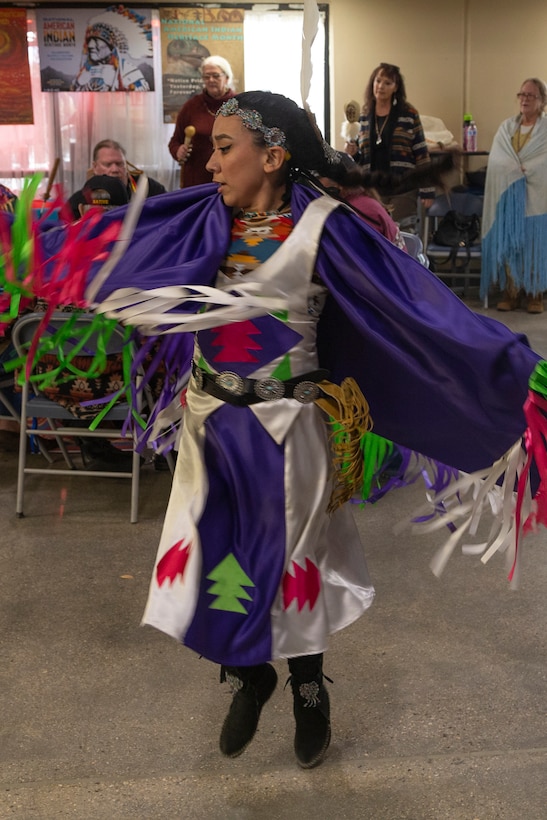 A woman participates in a traditional ceremonial dance during the National American Indian Heritage Month opening ceremony on Edwards AFB. From Nov. 1-30, the observance month recognizes American Indians for their respect for natural resources and the Earth, having served with valor in our nation's conflicts and for their many distinct and important contributions to the United States.