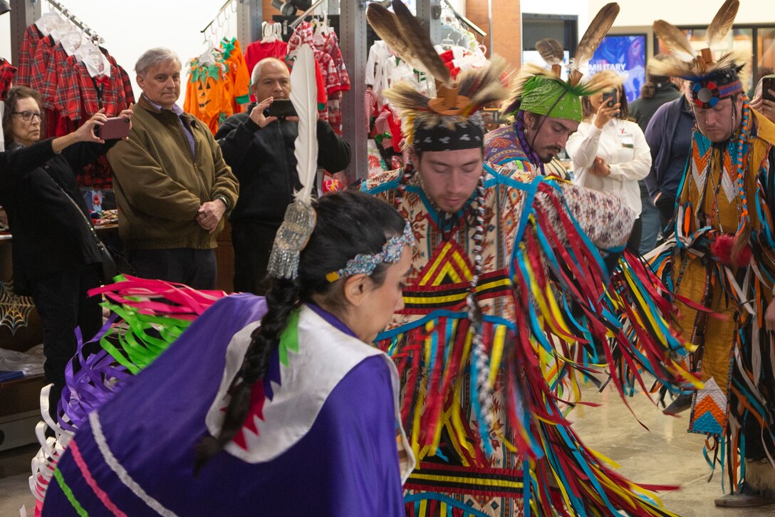 A group of attendees perform a traditional ceremonial dance during the National American Indian Heritage Month opening ceremony on Edwards AFB. From Nov. 1-30, the observance month recognizes American Indians for their respect for natural resources and the Earth, having served with valor in our nation's conflicts and for their many distinct and important contributions to the United States.