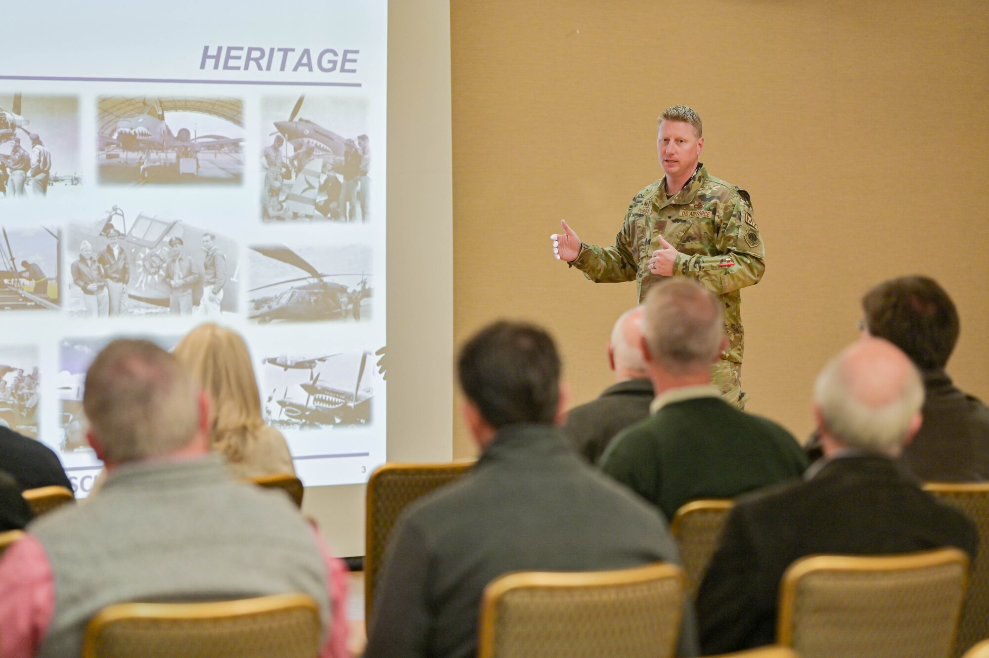 U.S. Air Force Col. Jason Purdy, 23rd Maintenance Group commander, briefs honorary commanders about the 23rd MXG heritage and mission at Moody Air Force Base, Georgia, Oct. 21, 2022. The immersion tour gave civilian leaders a behind-the-scenes look at the 23rd Wing mission and the Airmen who make the mission happen. (U.S. Air Force photo by Senior Airman Rebeckah Medeiros)