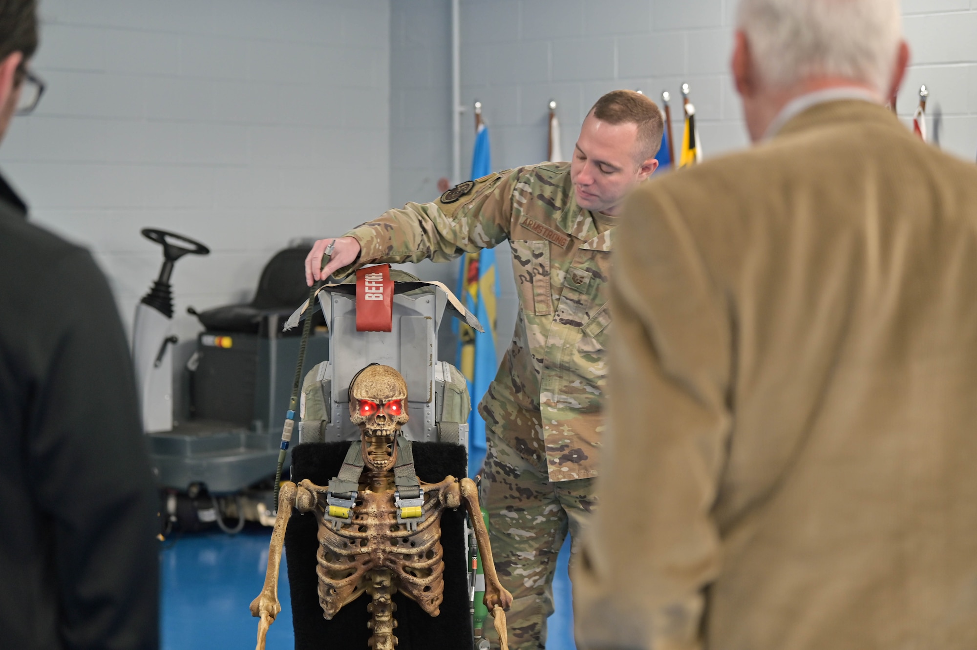 U.S. Air Force Tech. Sgt. Jeremy Armstrong, 23rd Maintenance Squadron egress systems craftsman, discusses the egress equipment capabilities during a 23rd Maintenance Group immersion tour at Moody Air Force Base, Georgia, Oct. 21, 2022. All aircrew are trained in egress plans to ensure safe operations of the aircraft. The immersion tour gives civilian leaders a behind-the-scenes look at the 23rd Wing mission and the Airmen who make it happen. (U.S. Air Force photo by Senior Airman Rebeckah Medeiros)